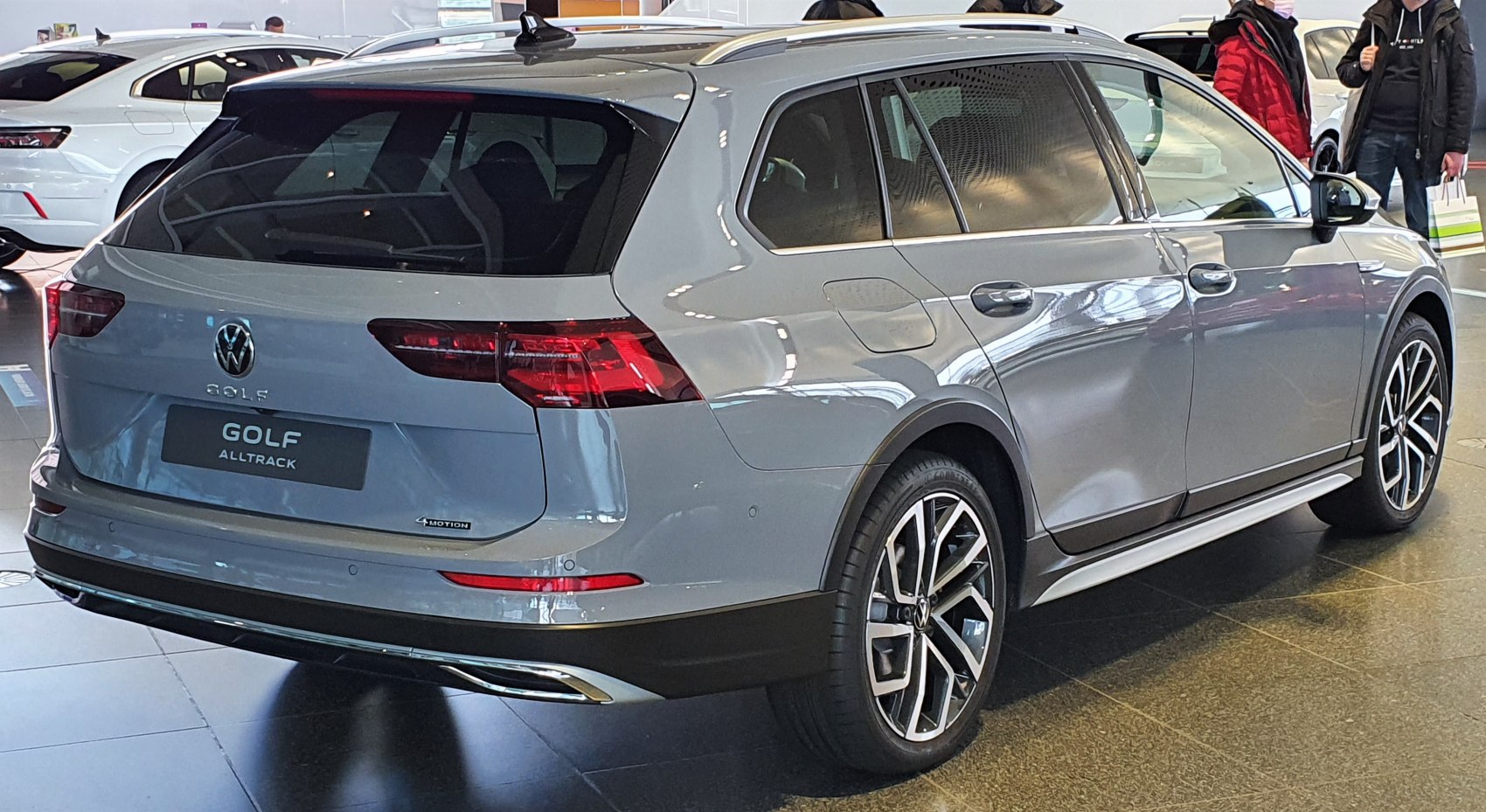 Rear side view with sporty alloy wheels and sleek tail lights