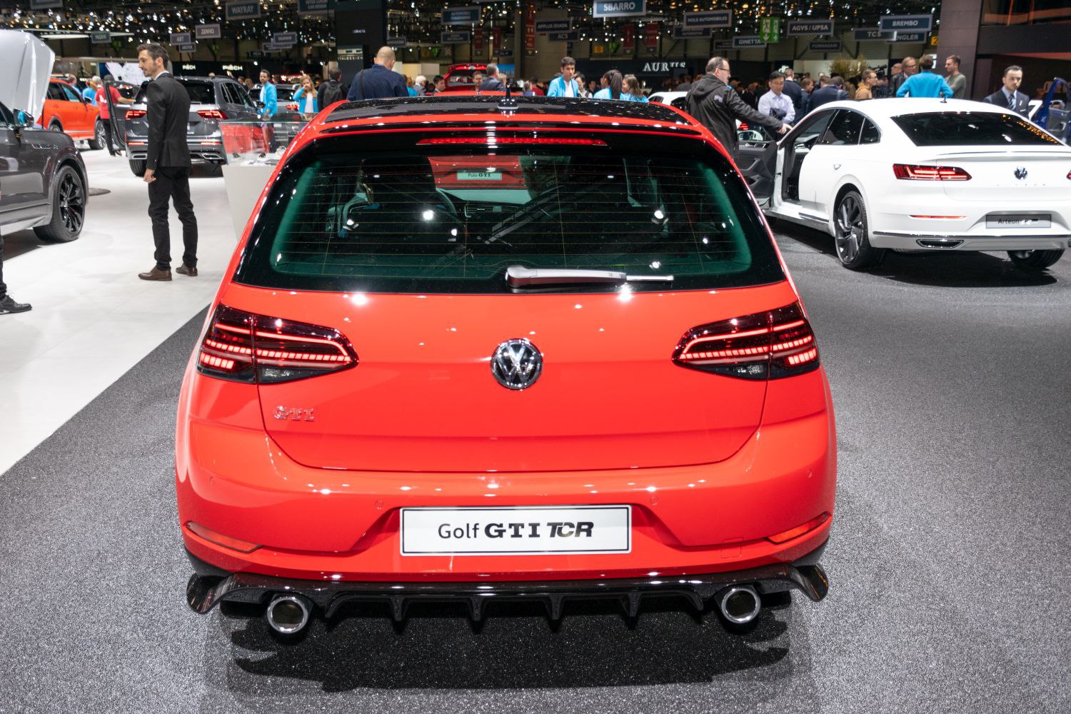 Sporty hatchback rear with distinctive taillights and dual exhausts