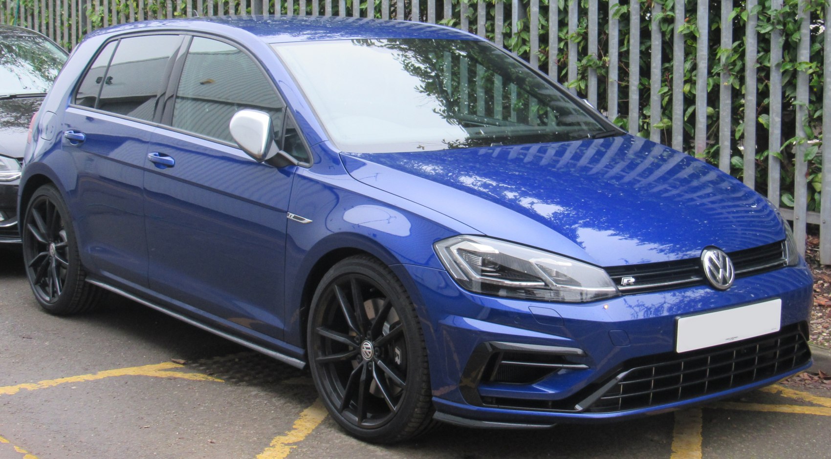 Front and side view of a 5-door hatchback with LED headlights and black alloy wheels