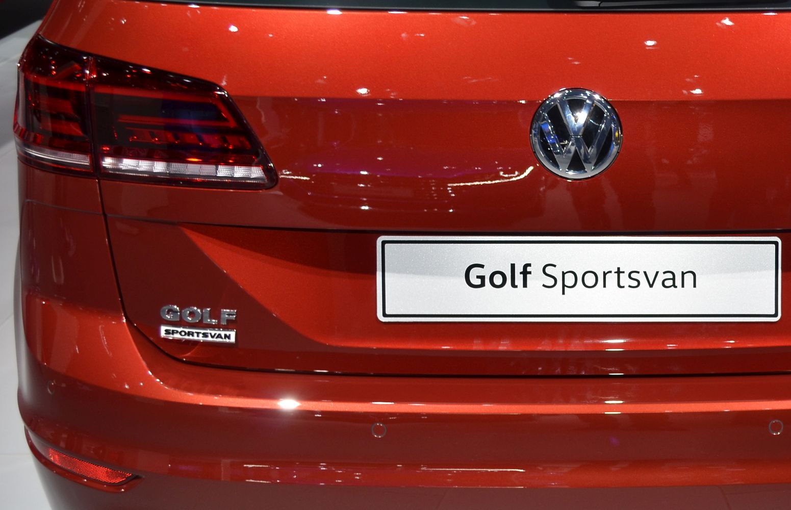 Close-up of rear badge and modern tail light design