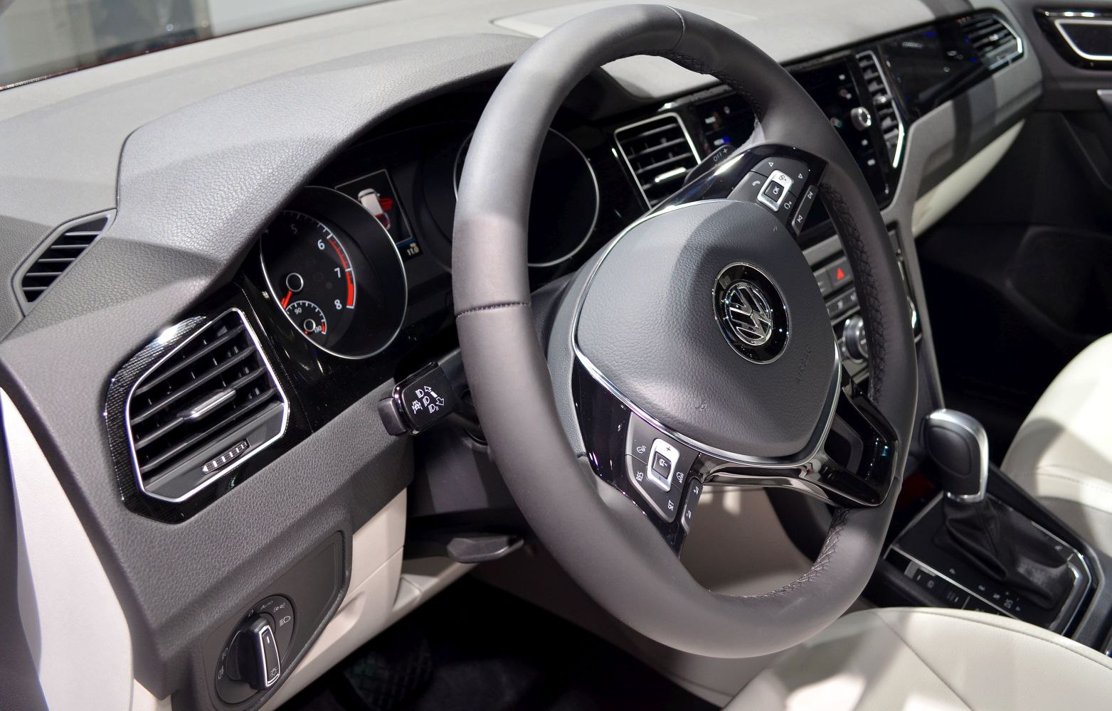 Steering wheel and dashboard interior close-up