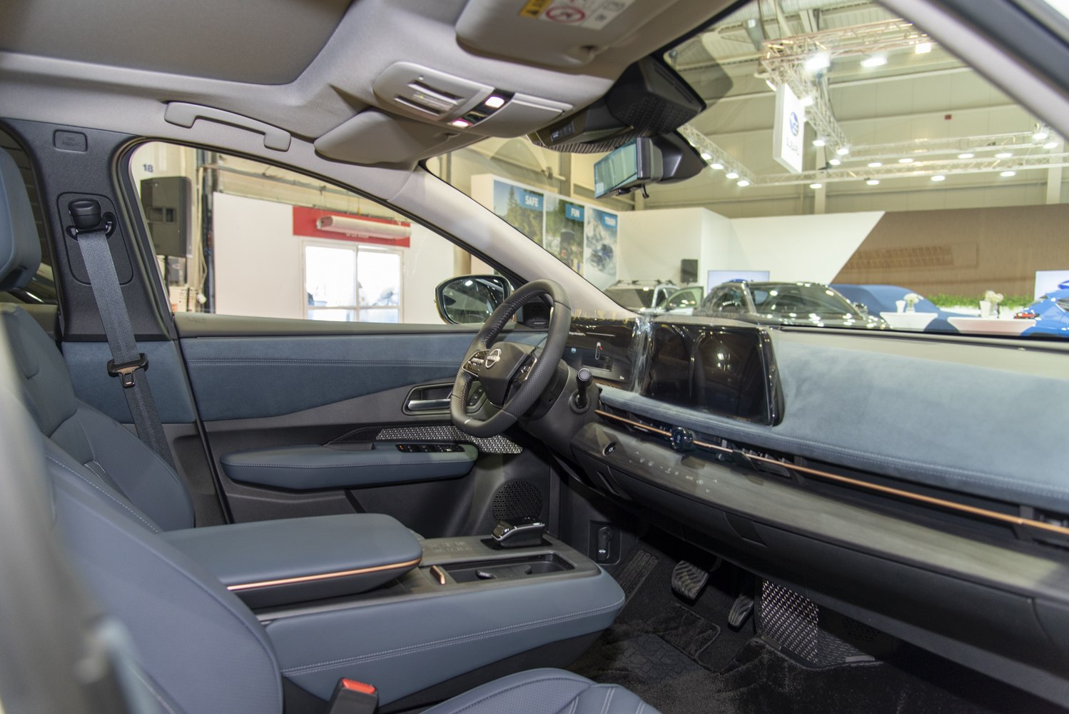 Modern car interior with digital dashboard and ergonomic seats