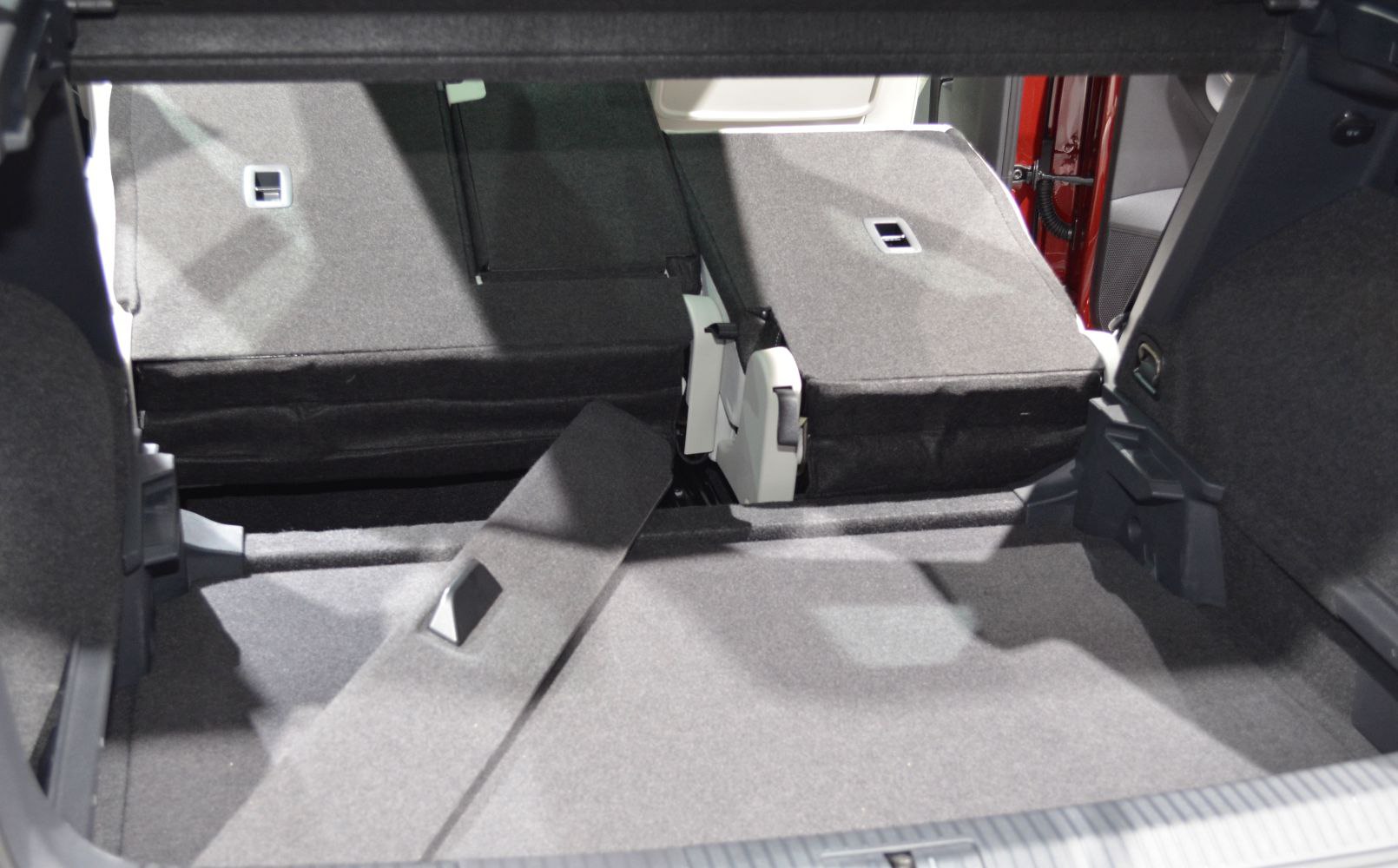 Folded rear seats with carpeted cargo area for extended storage