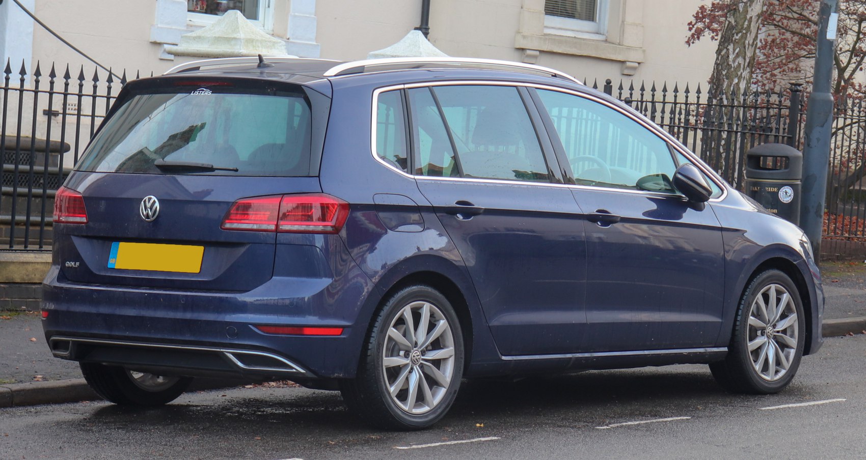 Rear and side view with taillights and alloy wheels