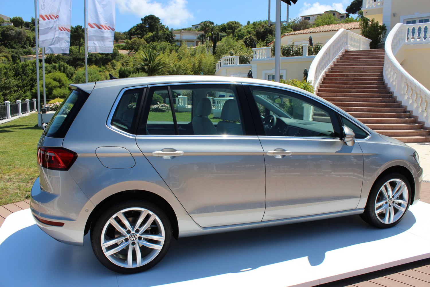 Silver 5-door compact MPV side profile with alloy wheels