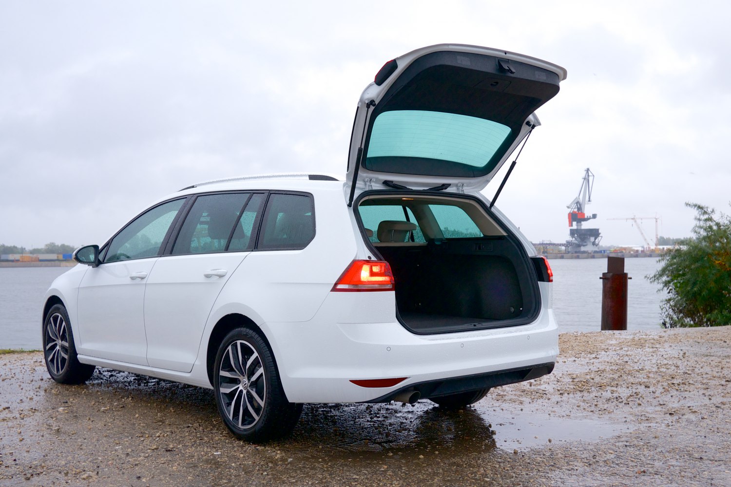 Rear view with open tailgate and trunk space