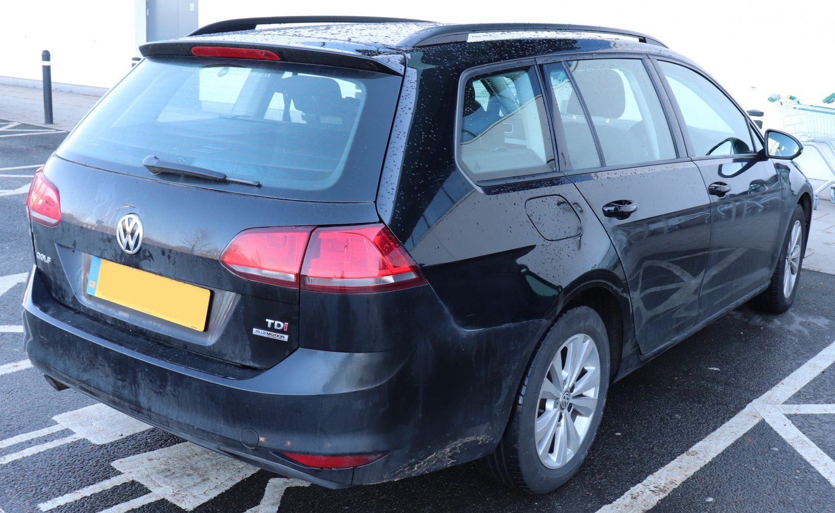 Rear view of station wagon with taillights and rear window wiper