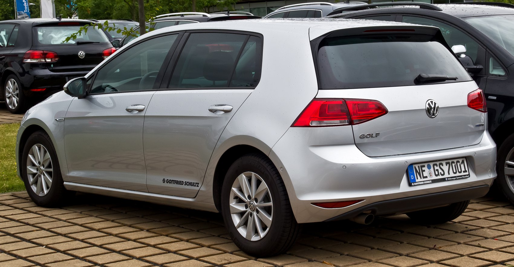 Silver 5-door hatchback rear and side view with alloy wheels and LED taillights