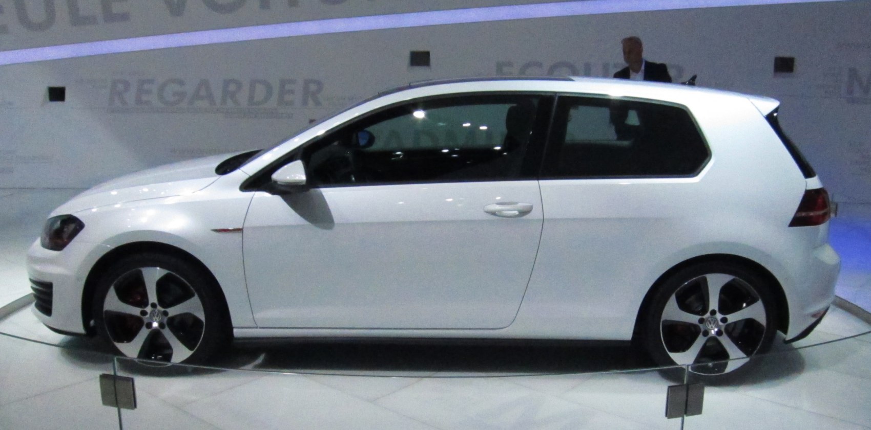 3-door hatchback with sporty alloy wheels, clean side profile, and modern door handles
