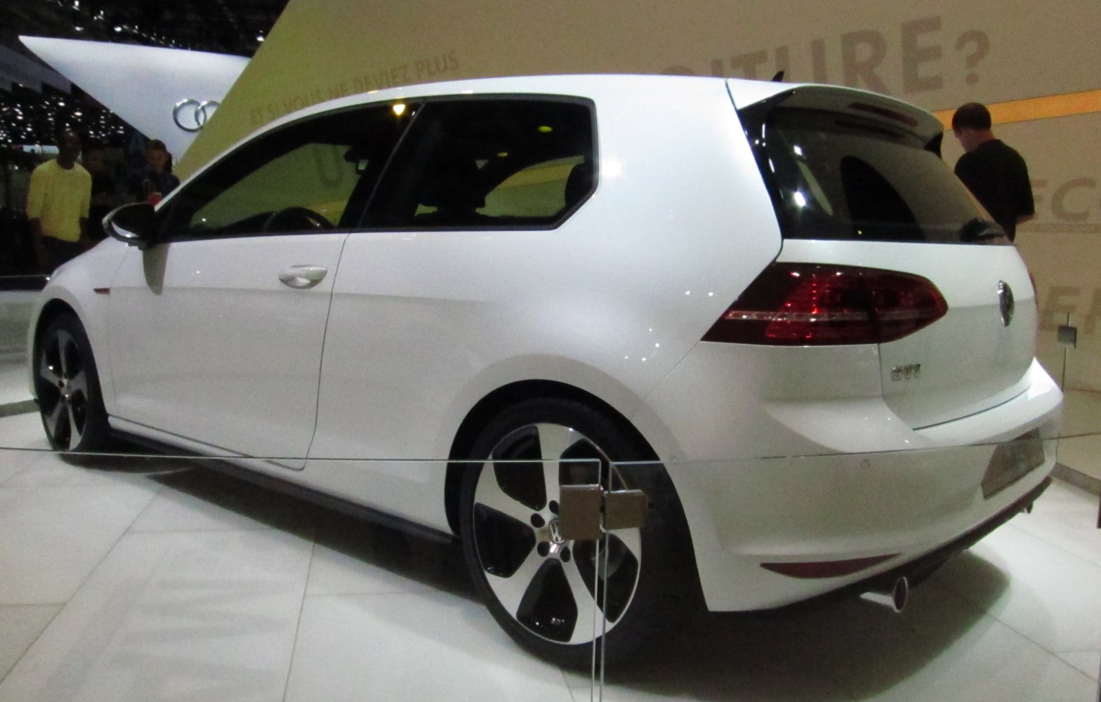 Rear side view with taillights and alloy wheels