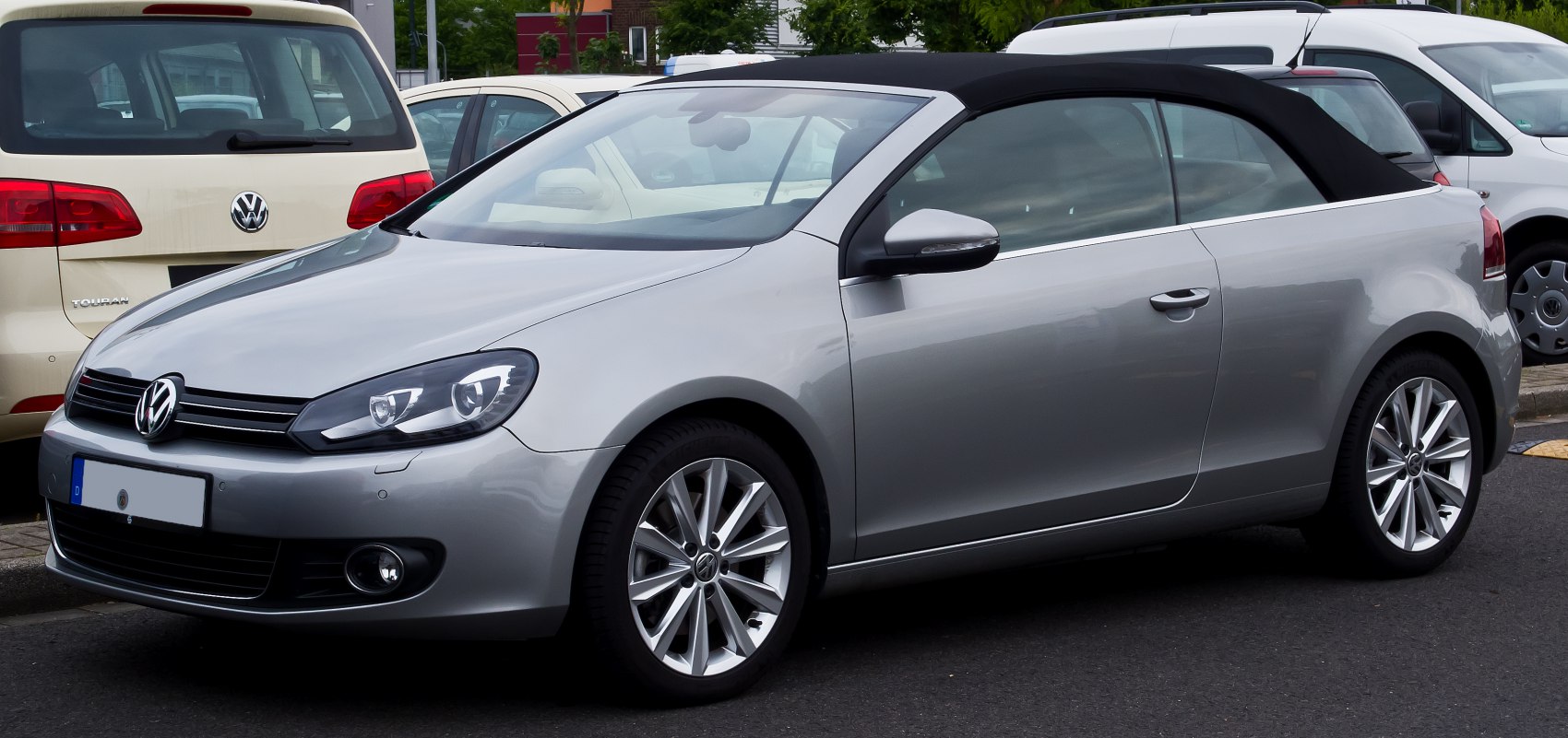 Silver convertible with fabric roof and alloy wheels