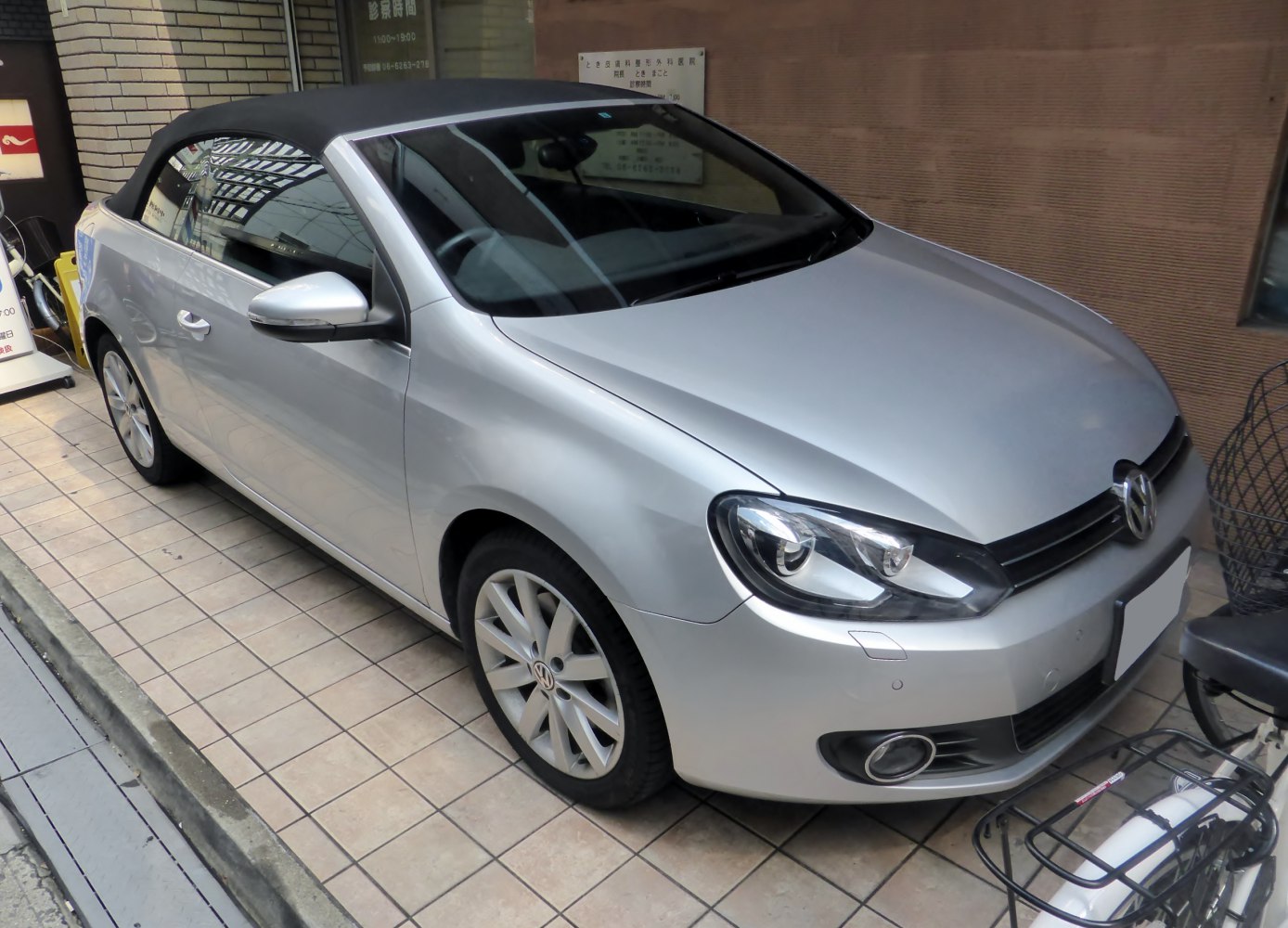 Convertible with soft top roof and alloy wheels