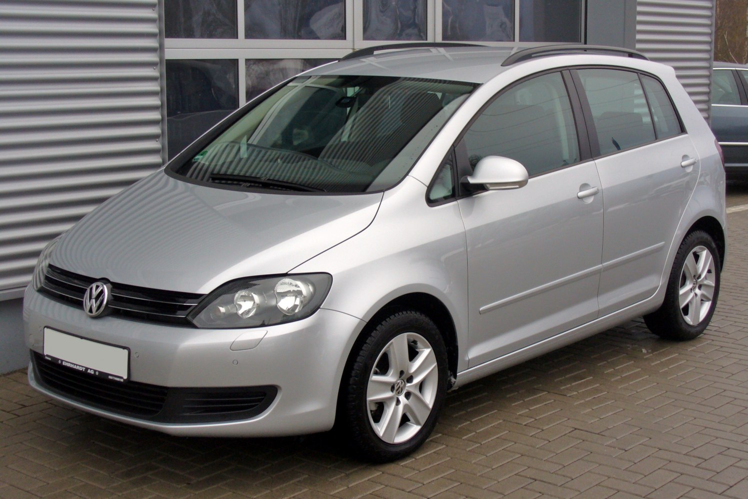 Silver 5-door hatchback with alloy wheels, front and side view