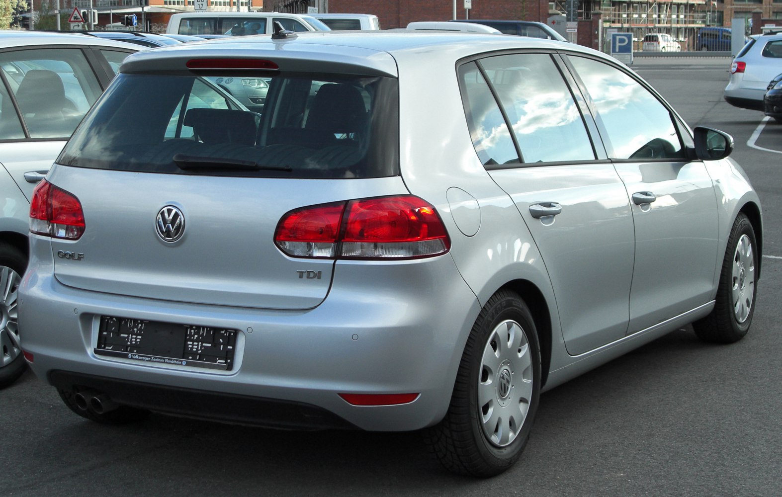 Rear view of 5-door hatchback with TDI badge and rounded taillights