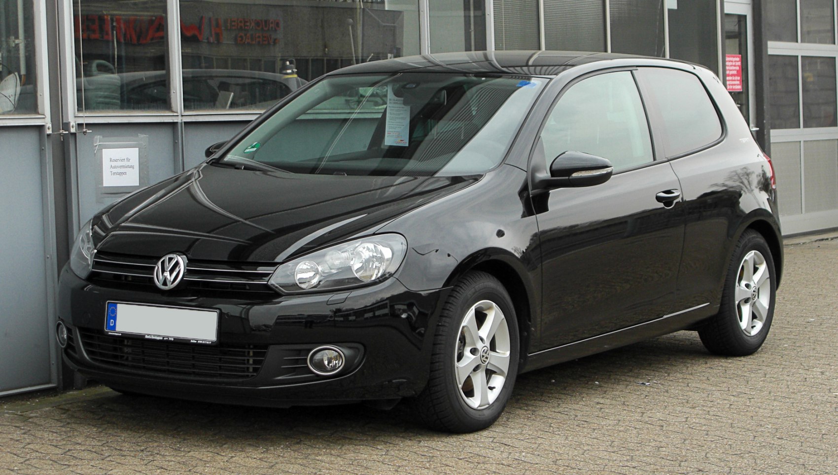 Black 3-door hatchback with front and side profile