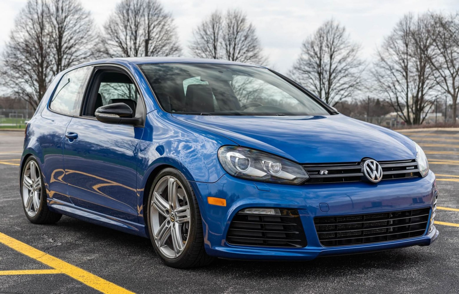 Sporty headlights and alloy wheels on 3-door compact hatchback.