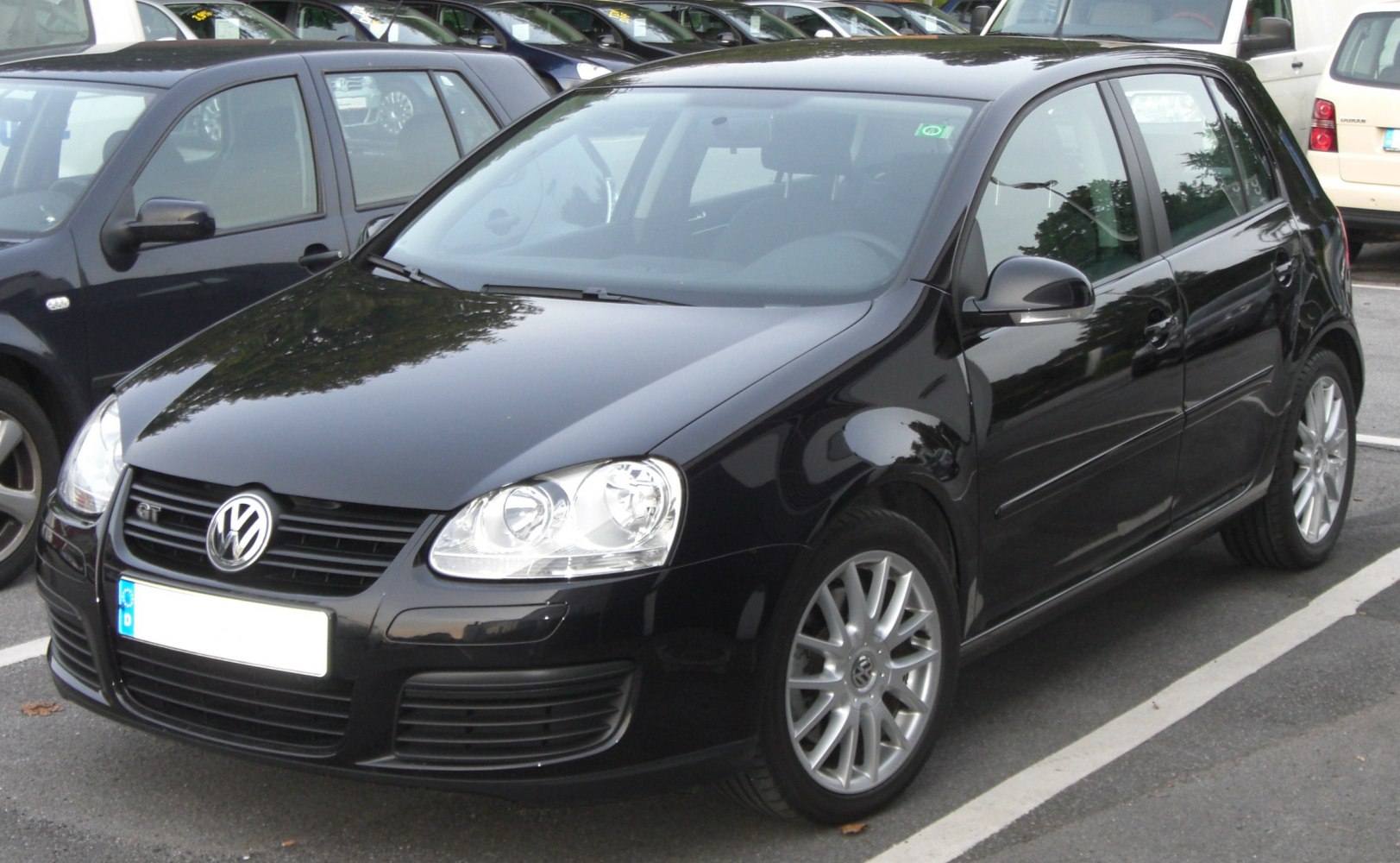 Black 5-door hatchback with alloy wheels, front-side angle