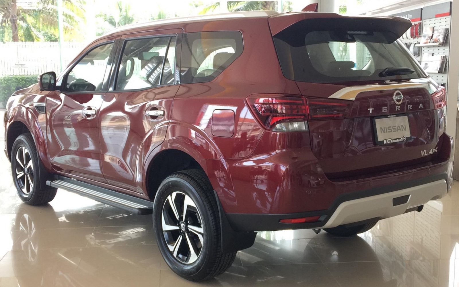 Rear and side view of modern SUV with alloy wheels and rear spoiler