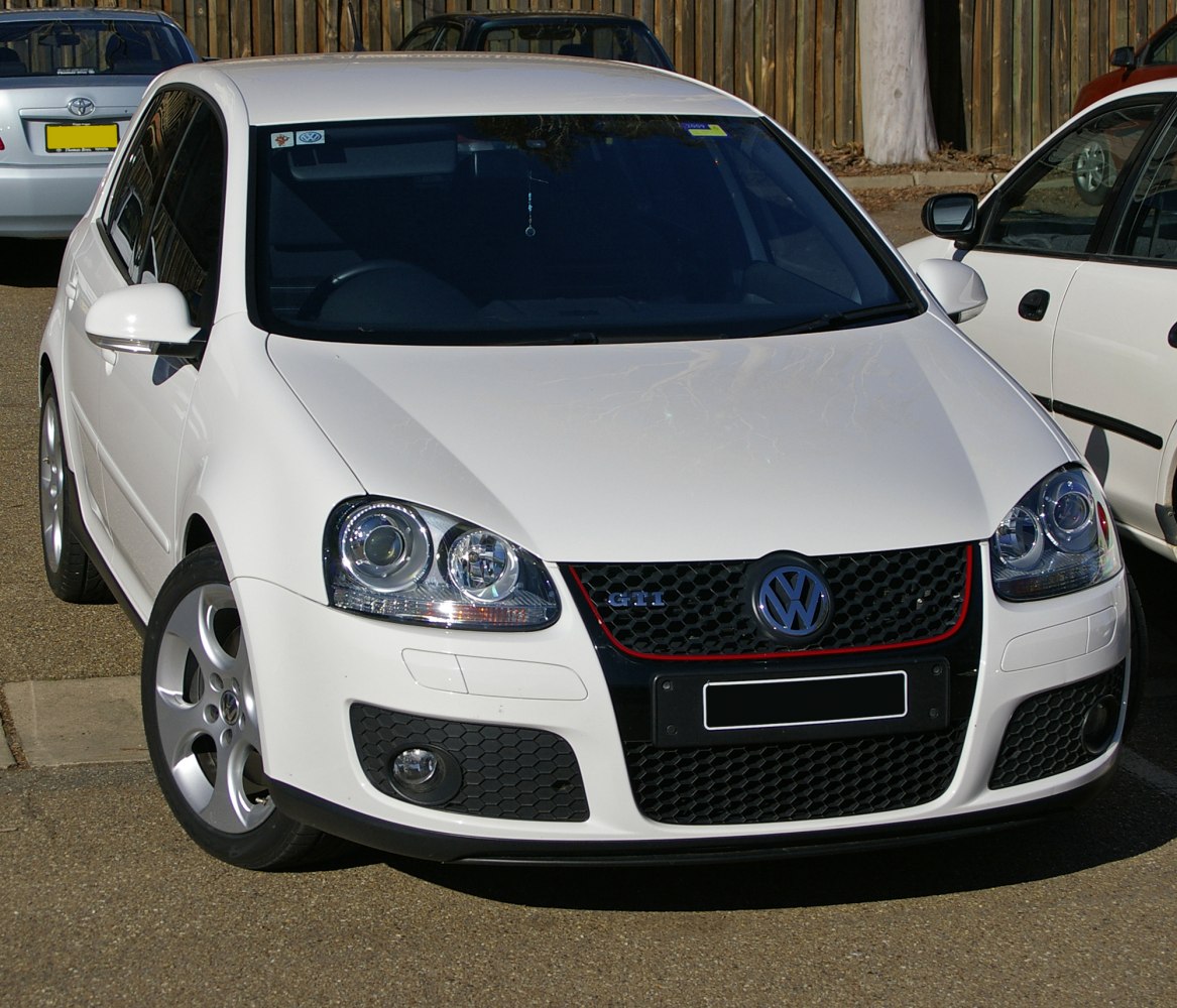 Front view with distinctive headlights and honeycomb grille