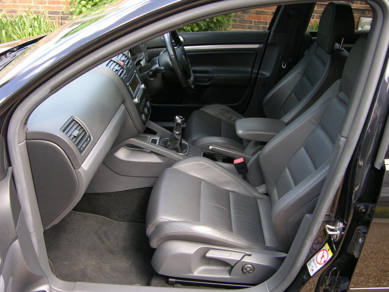 Leather front seats and manual transmission interior layout