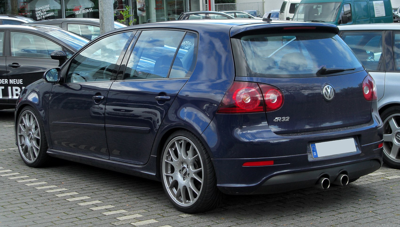 Rear hatchback with dual exhaust and alloy wheels