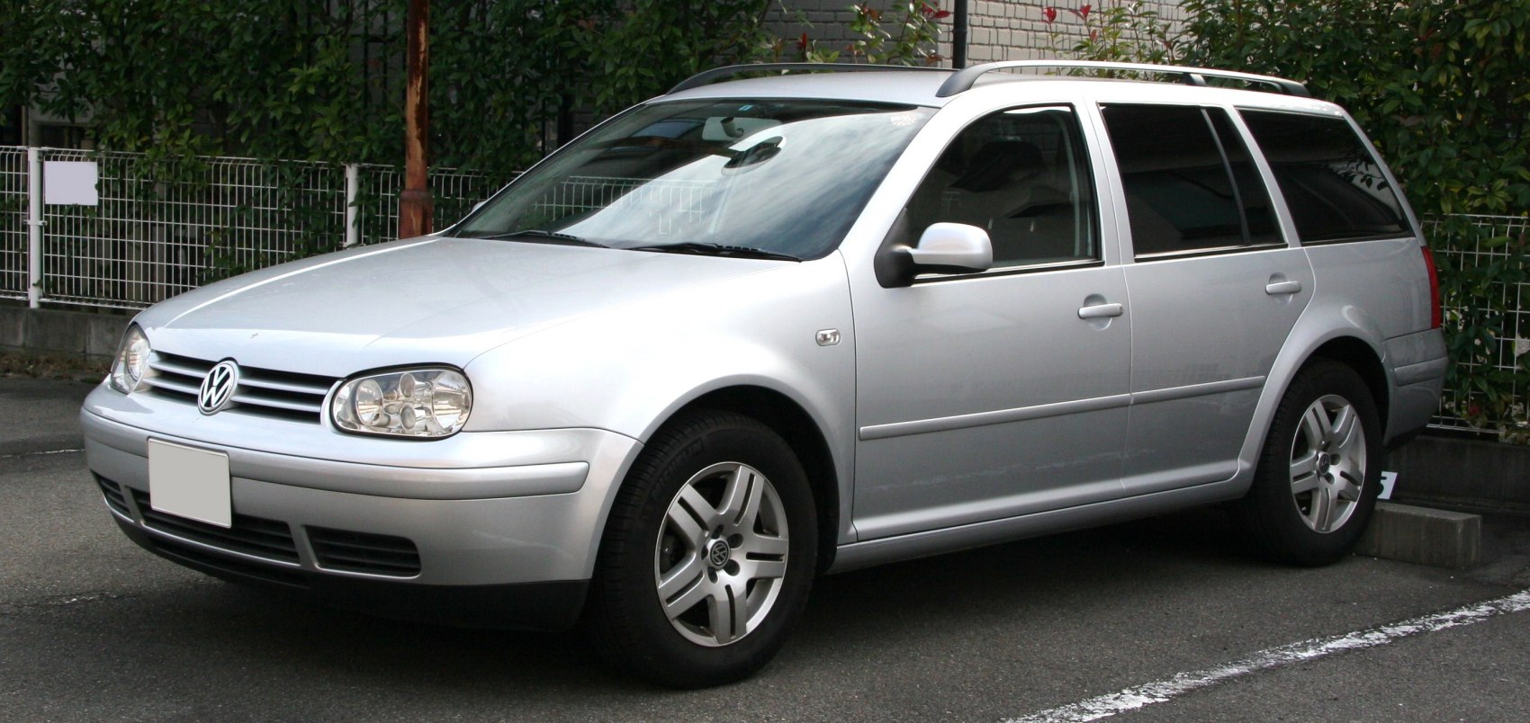 Silver station wagon with roof rails and alloy wheels