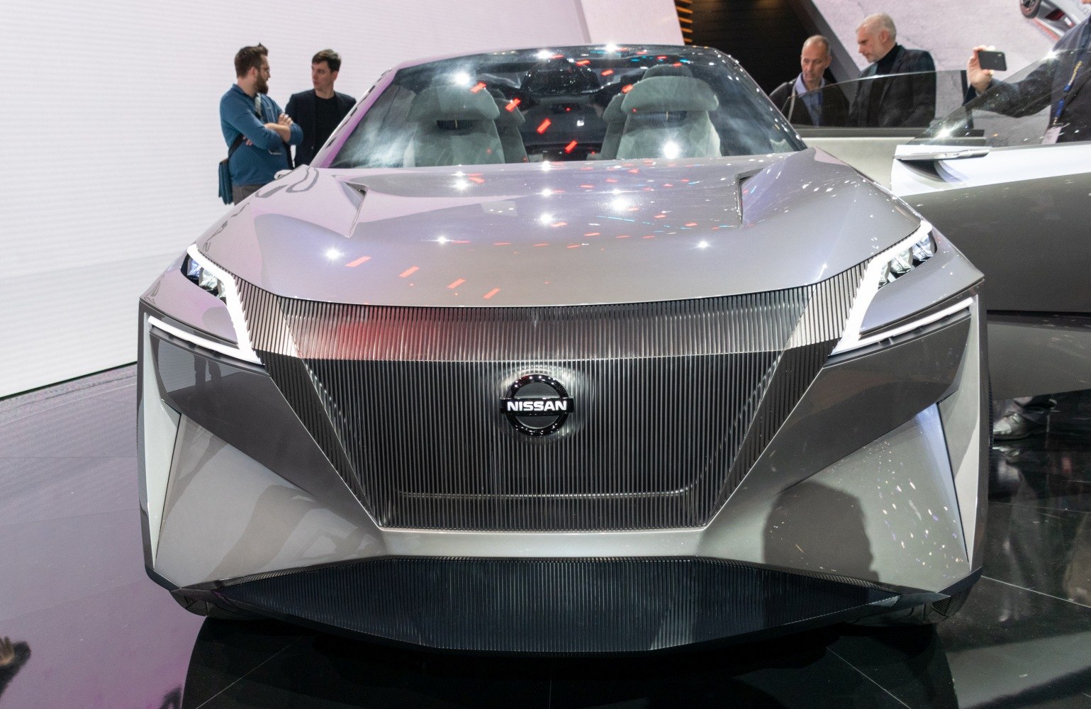 Futuristic front design with sharp LED headlights and innovative grille