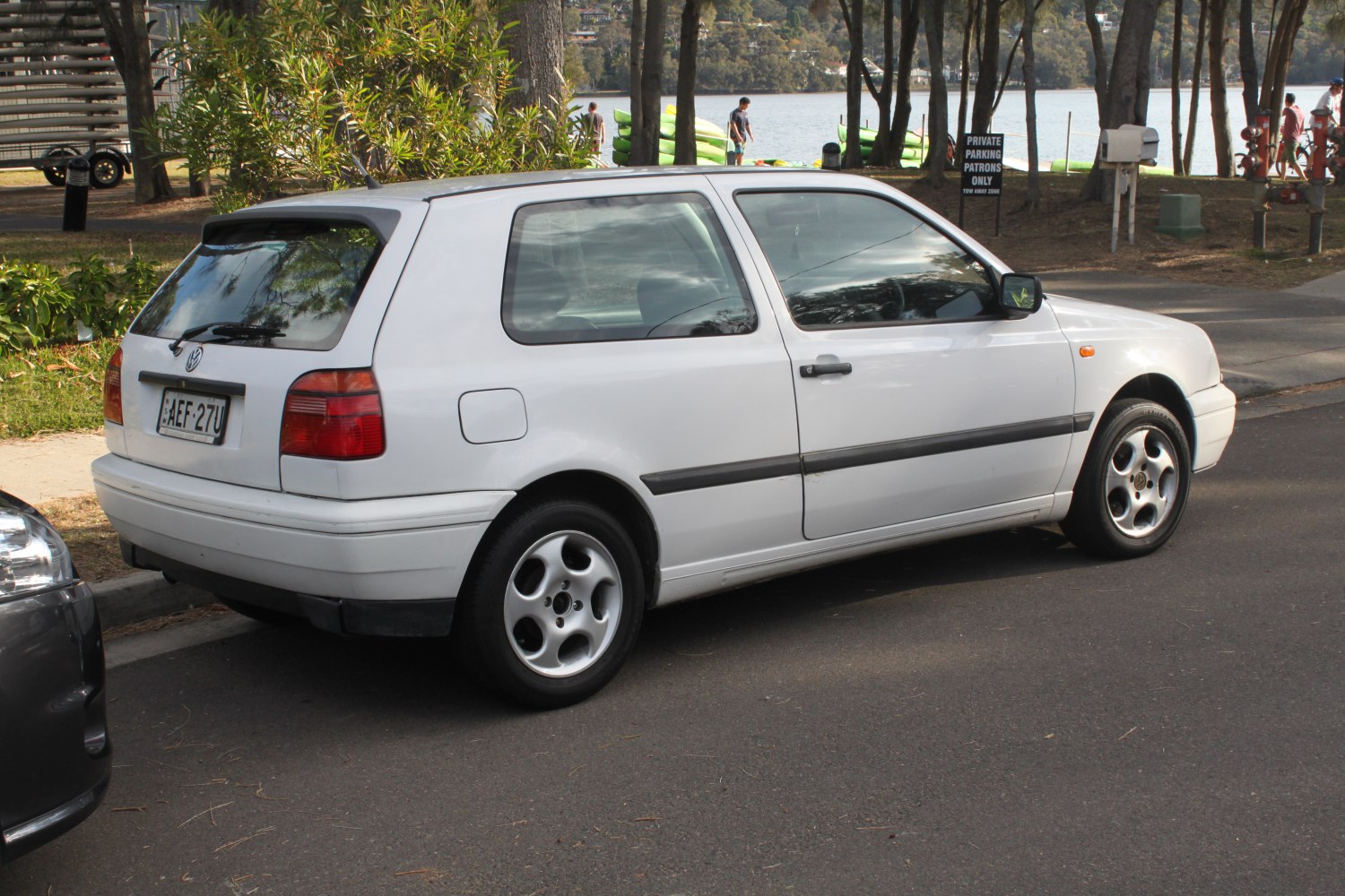 White 3-door hatchback with rounded rear and alloy wheels