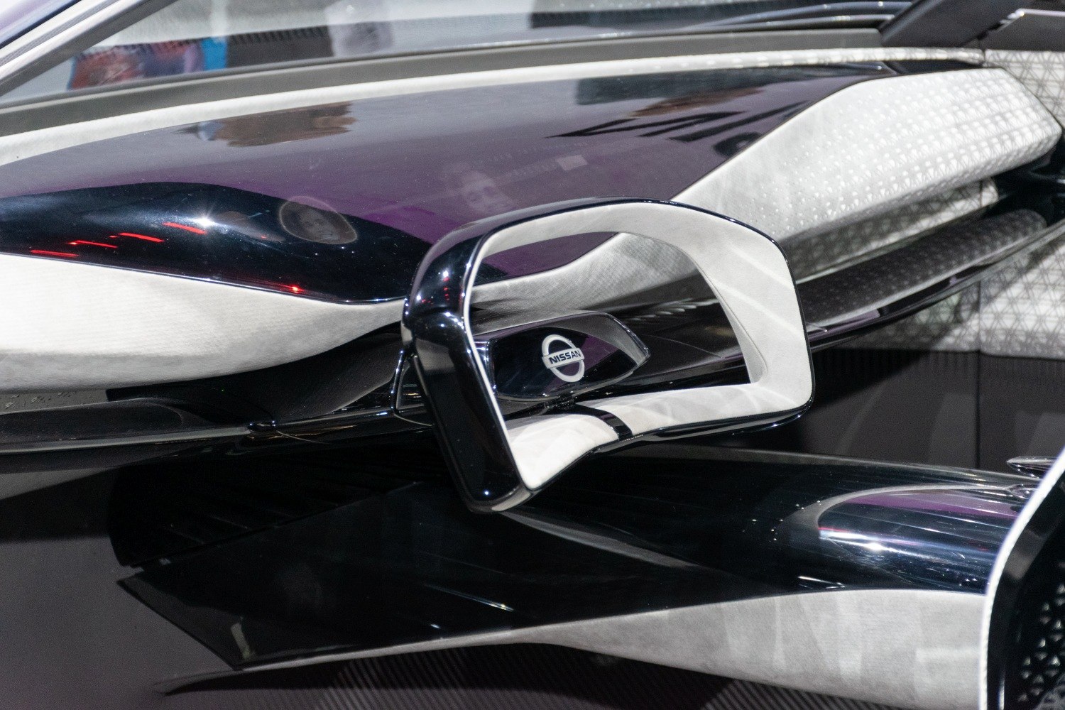 Futuristic side mirror design with sleek black and white elements