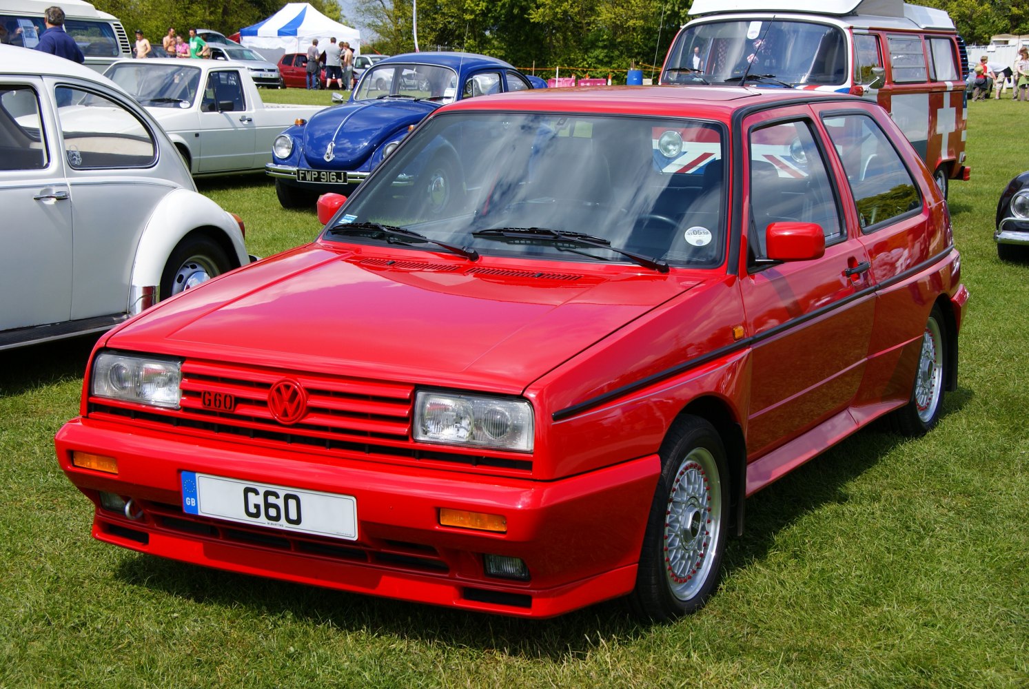Red 3-door classic hatchback with facelift front and sporty alloy wheels