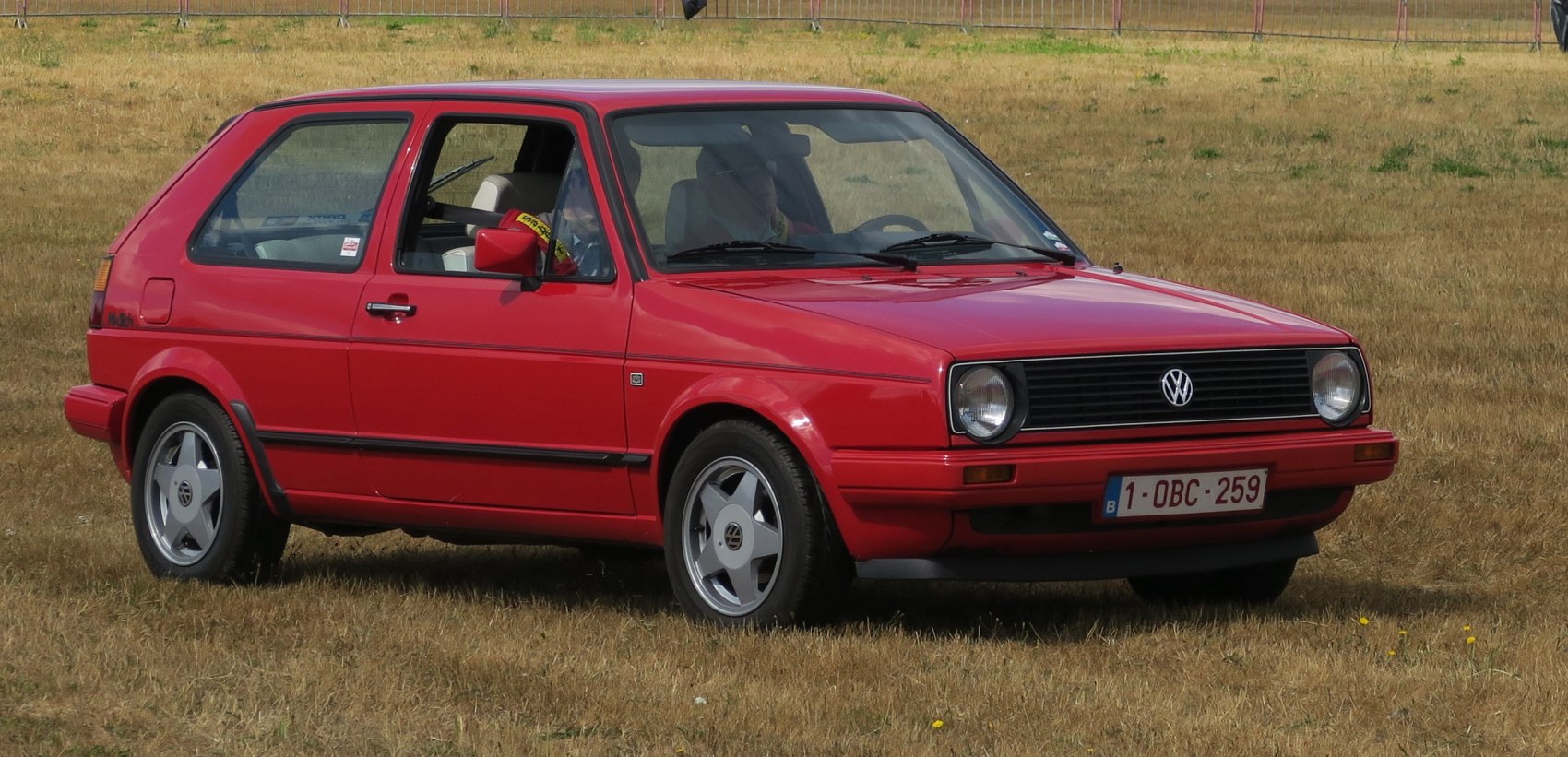 Classic 3-door hatchback with boxy shape and alloy wheels