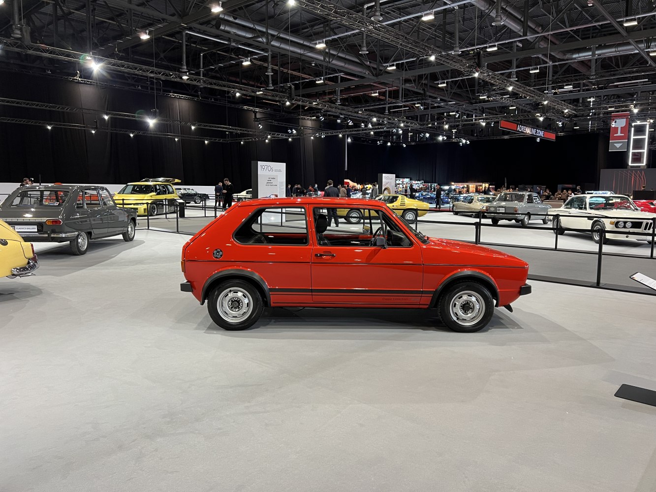 Red classic 3-door vintage hatchback side profile
