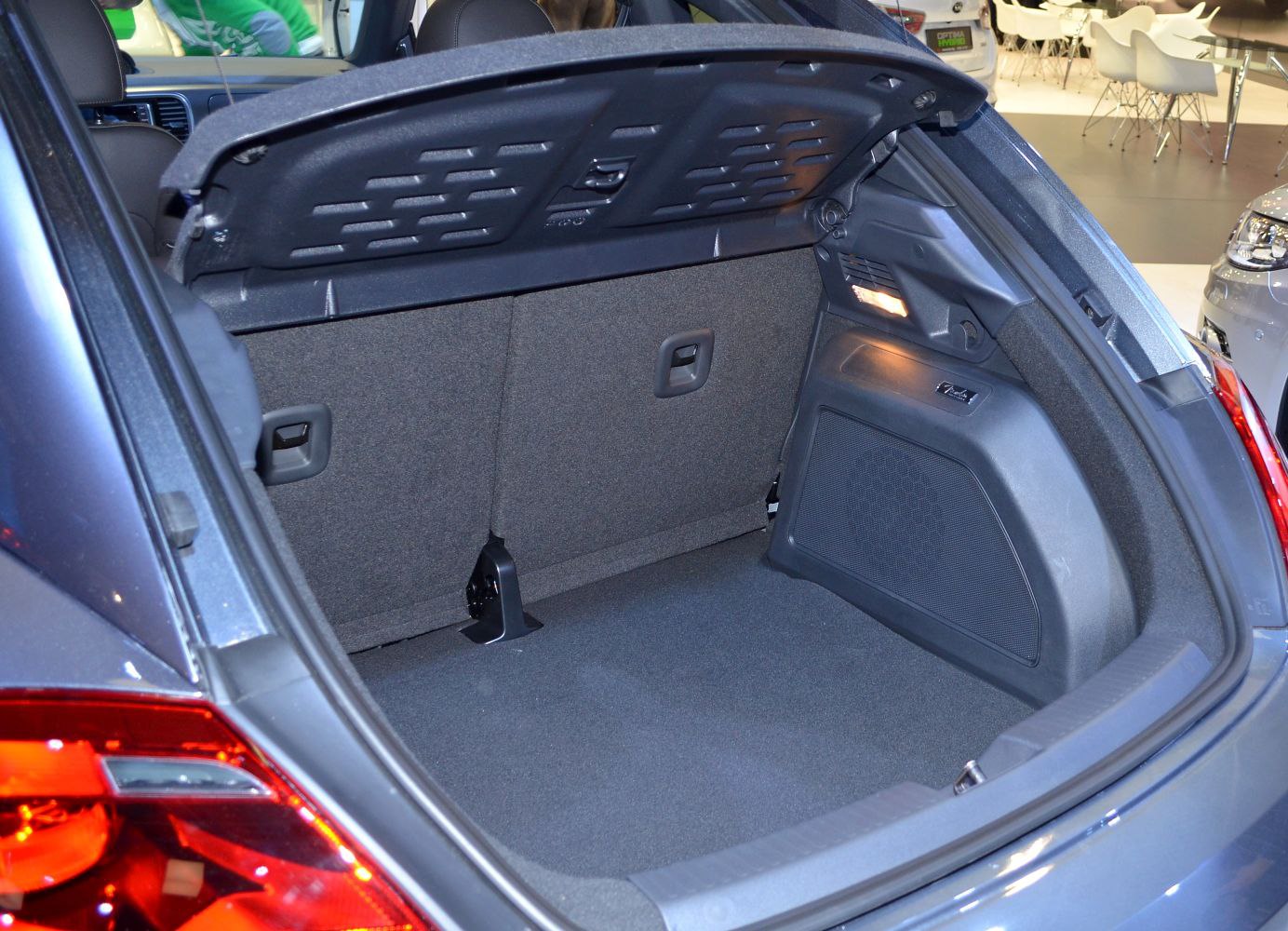 Spacious trunk cargo area with interior lighting in a hatchback.
