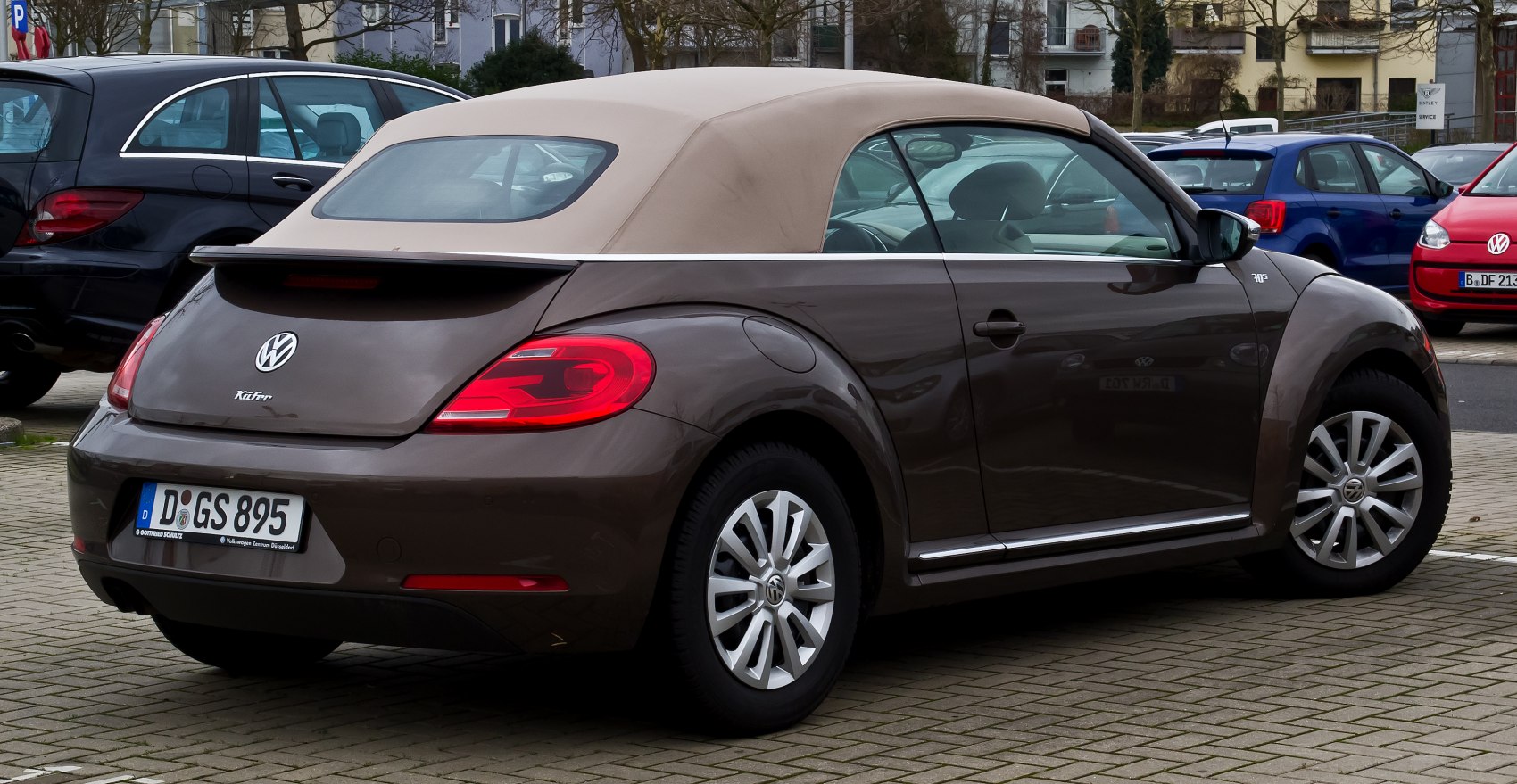 Soft top convertible with distinctive rear taillights and alloy wheels