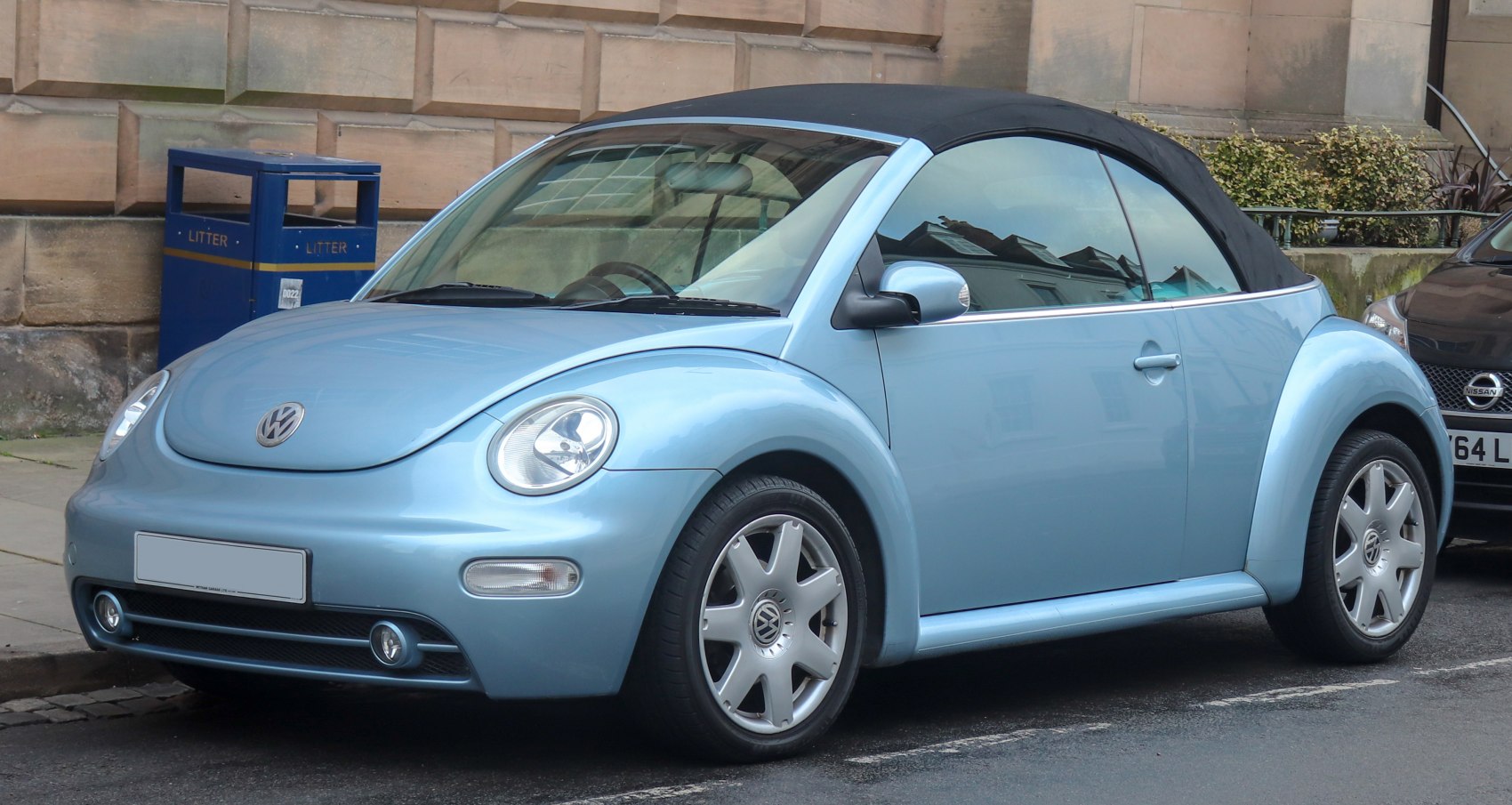 Soft top convertible roof and rounded headlights