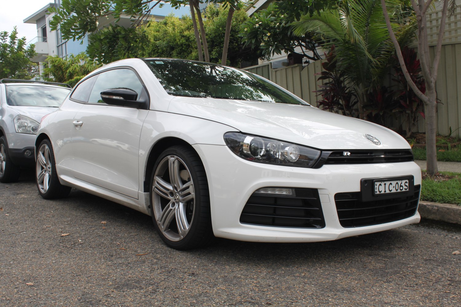 Front and side view with headlights and alloy wheels