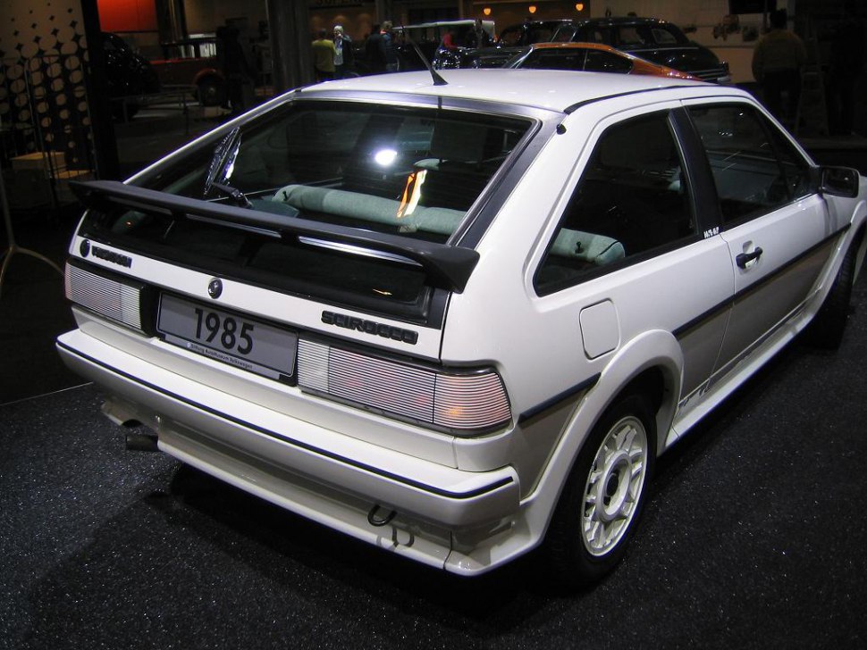 Rear view of hatchback with spoiler and classic taillights