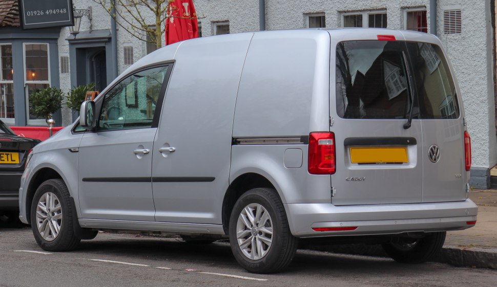 Silver compact panel van with dual rear doors and side sliding door