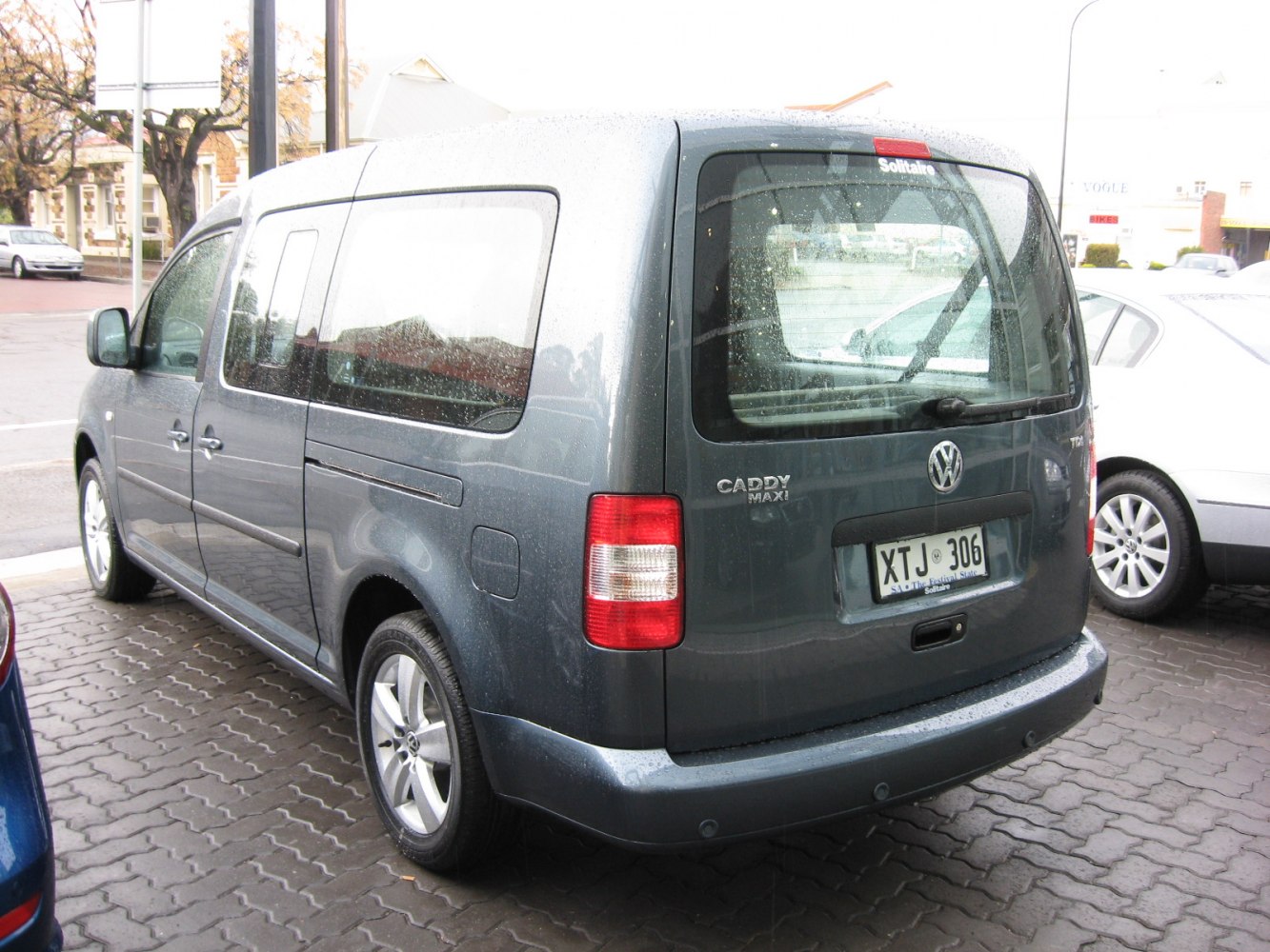 Rear view showing back window, tail lights, and license plate.