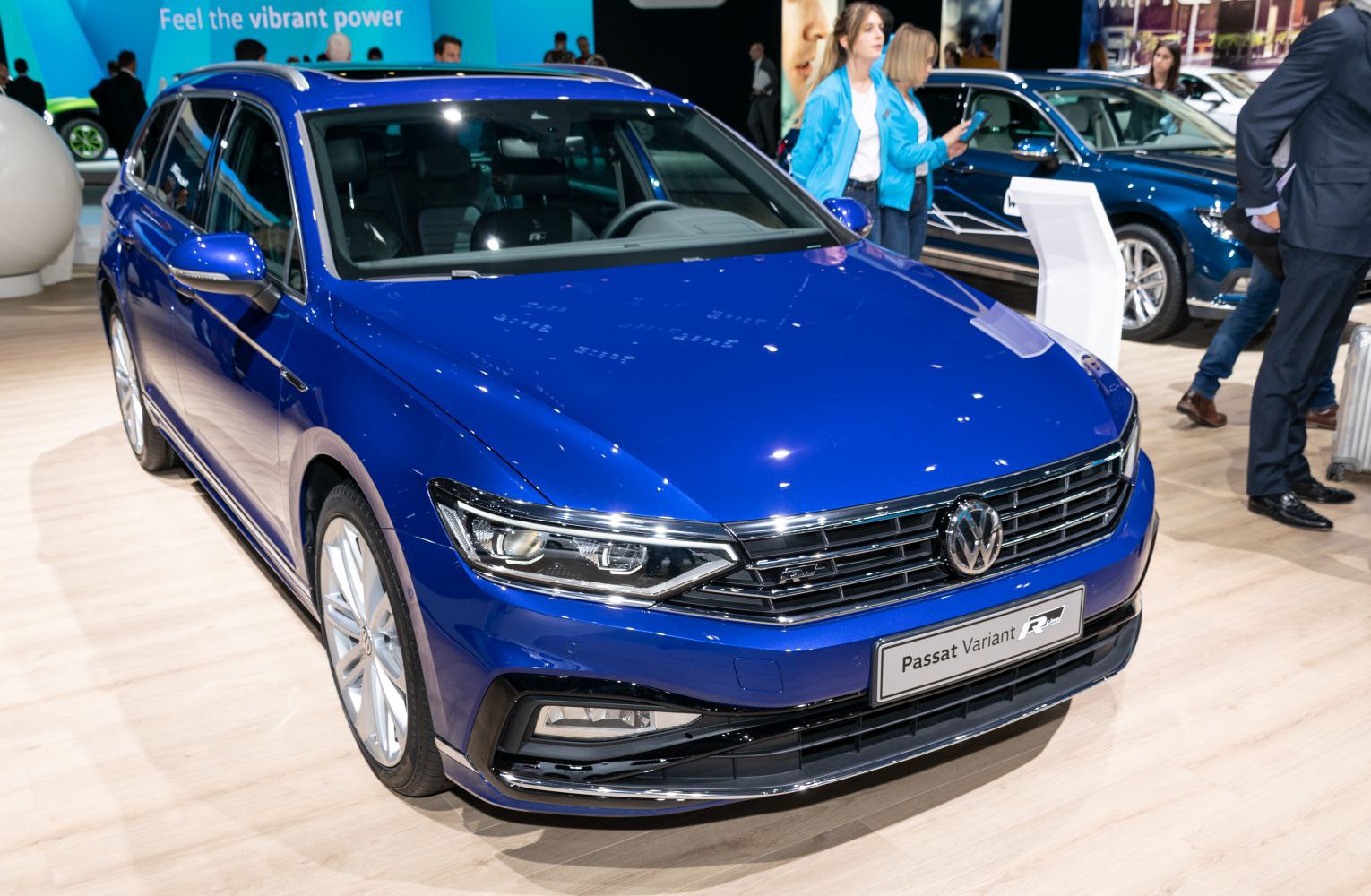 Front view of sleek station wagon with LED headlights and chrome grille