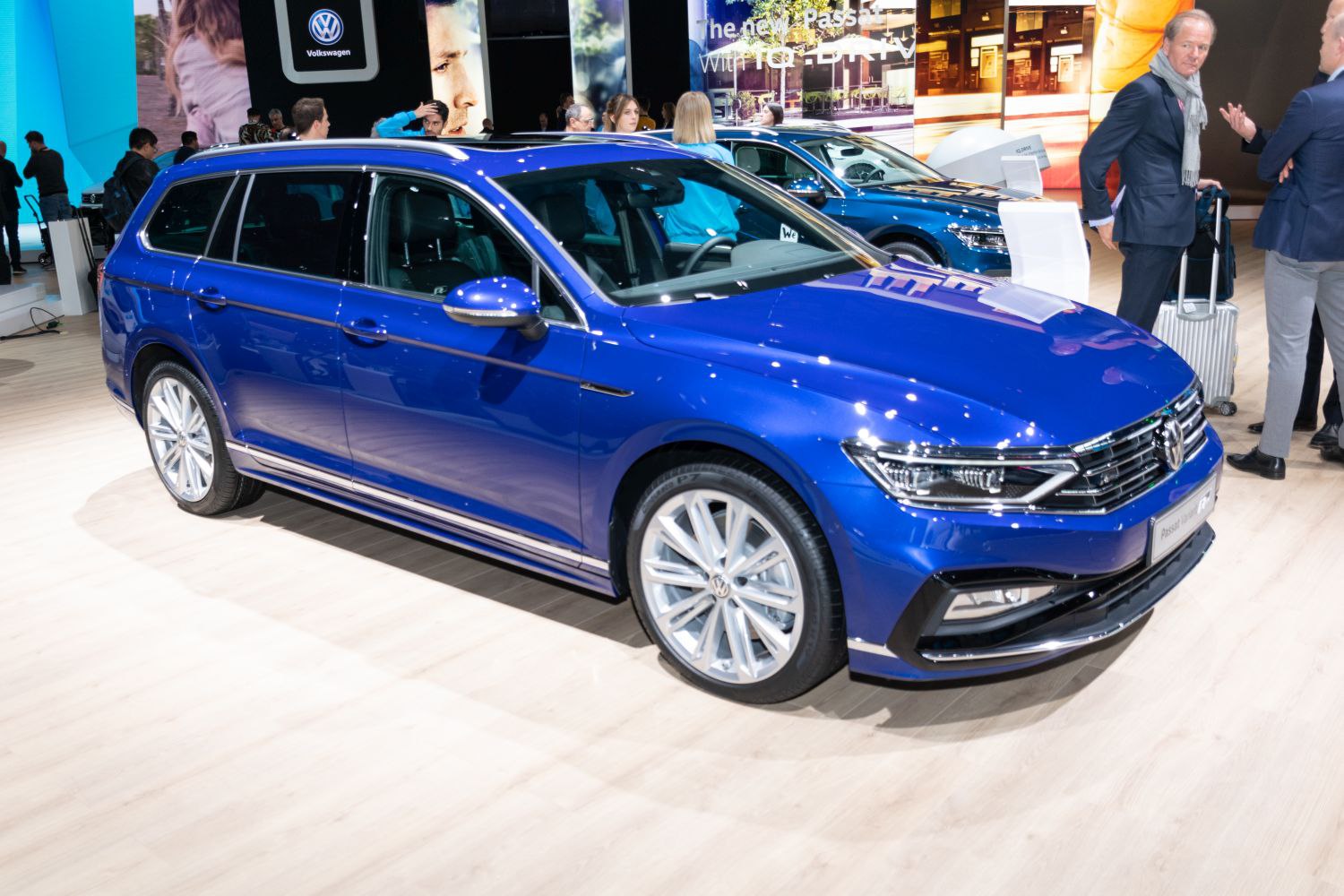 Blue mid-size wagon with LED headlights and alloy wheels