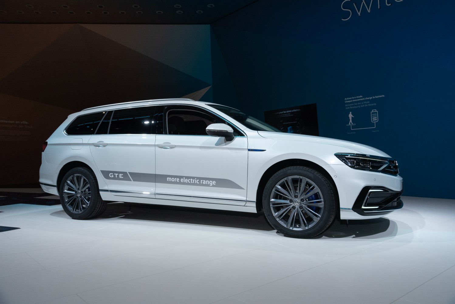 Side profile of hybrid estate with GTE badge and electric range decal