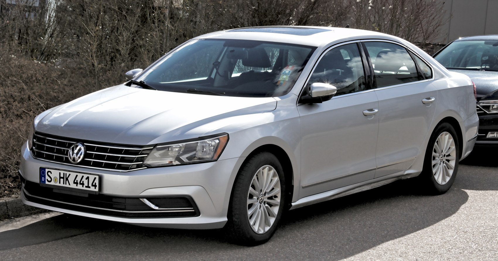 Front grille and aerodynamic side profile of mid-size sedan