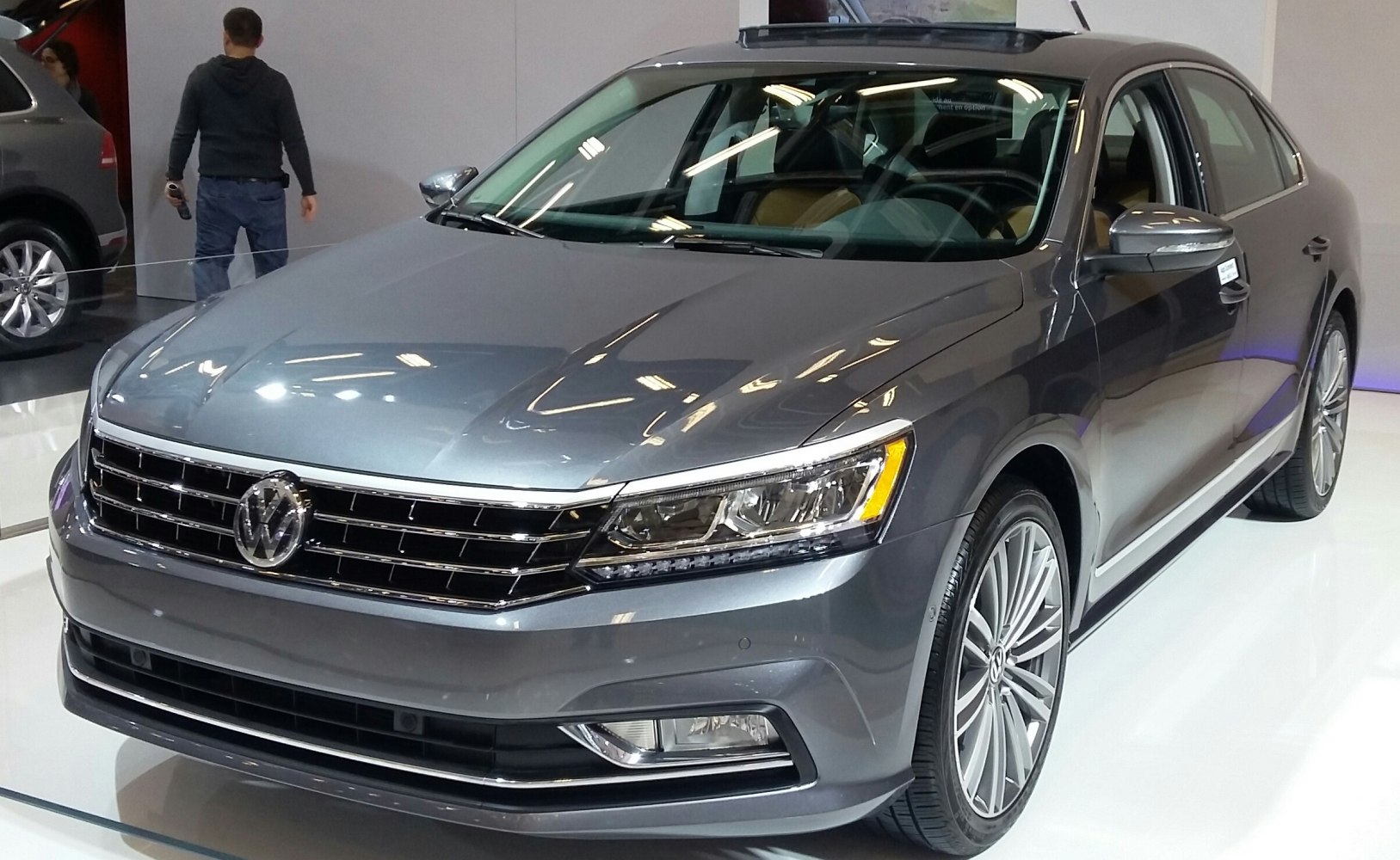 Front view showing grille, headlights, and alloy wheels of a modern sedan