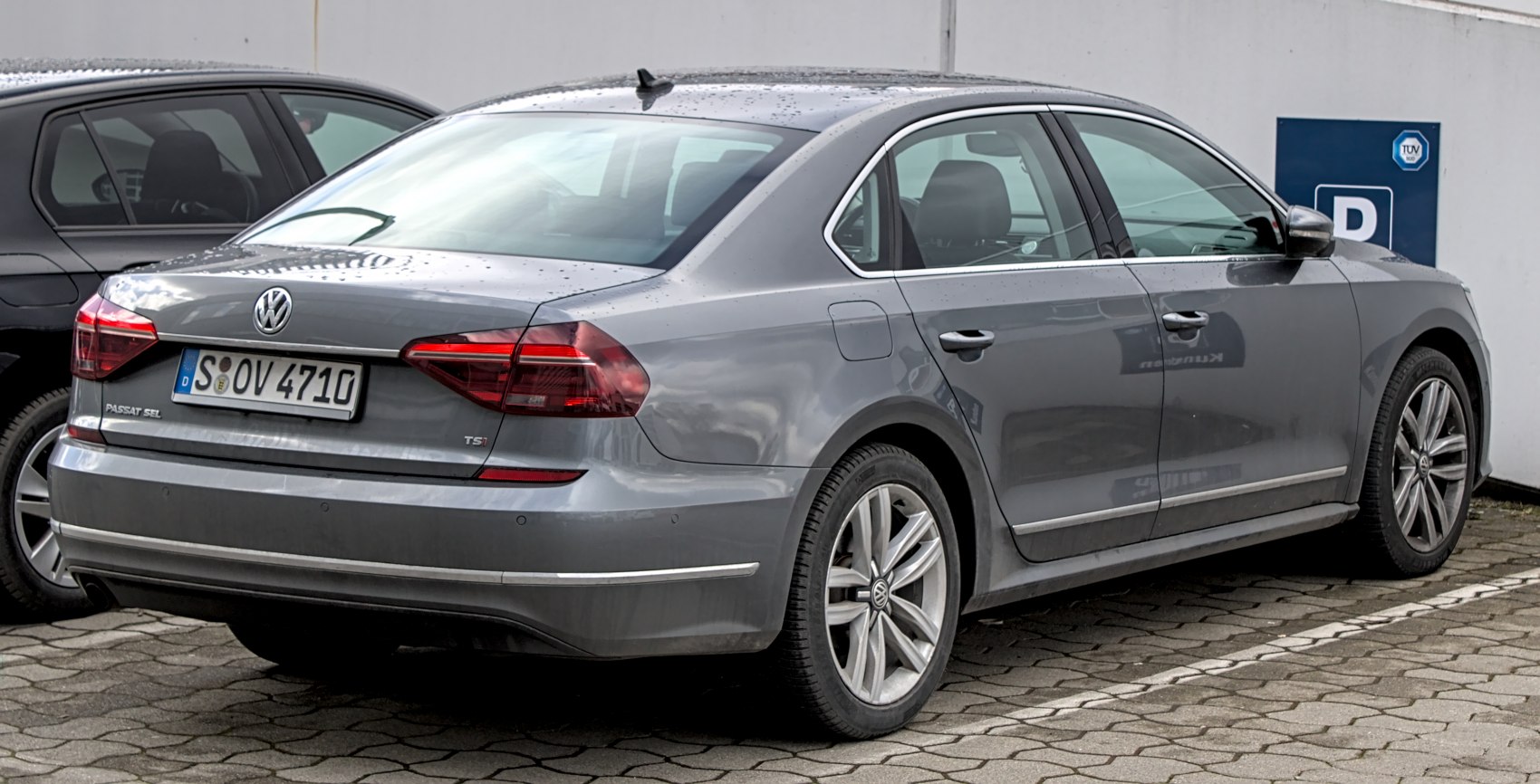 Rear view of sleek sedan with distinct tail lights