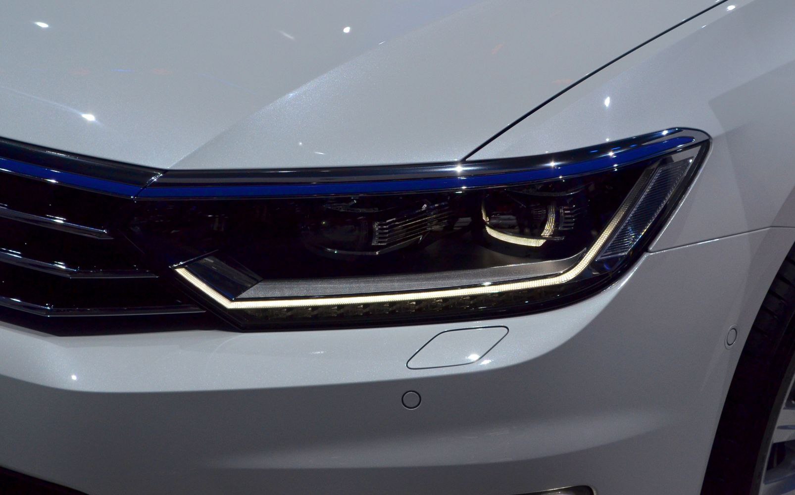 Close-up of distinctive LED headlight and front styling
