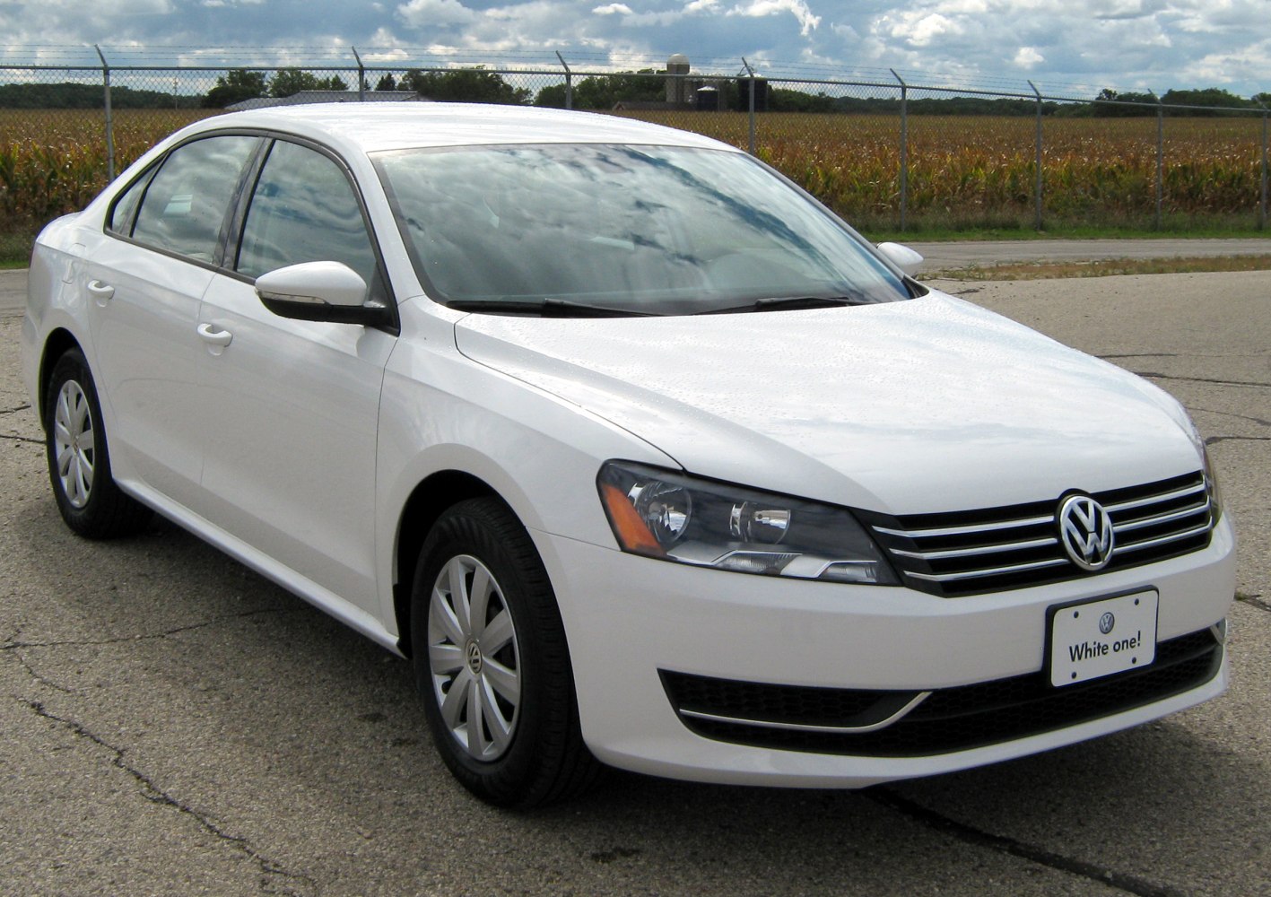 Front three-quarter view of a mid-size sedan highlighting grille, headlights, wheels