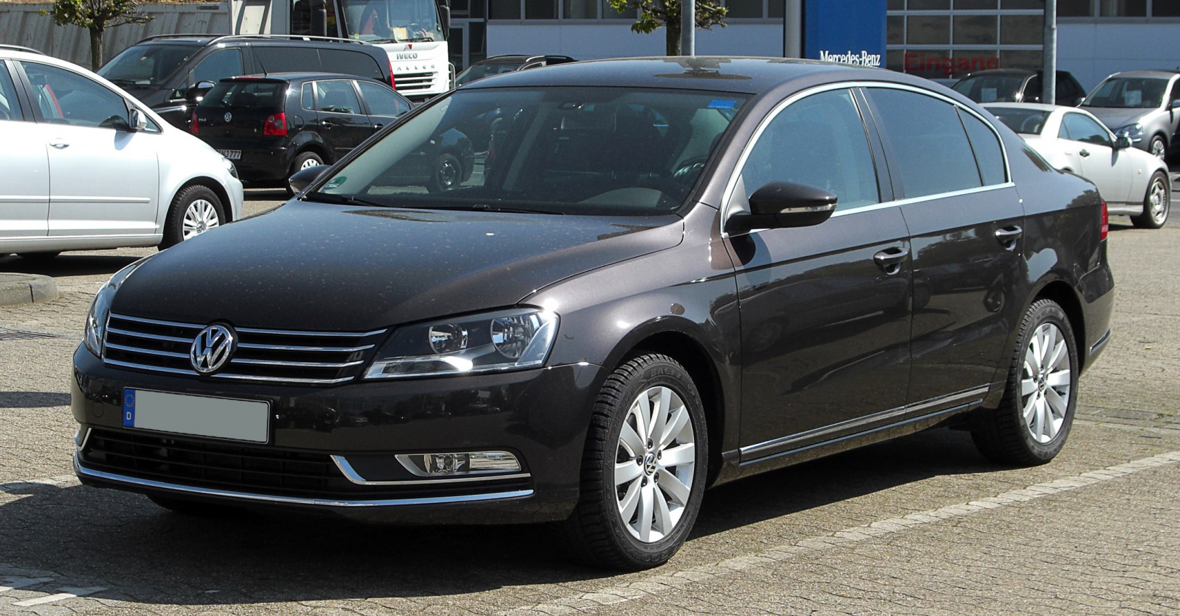 Sedan with modern projector headlights and multi-spoke alloy wheels