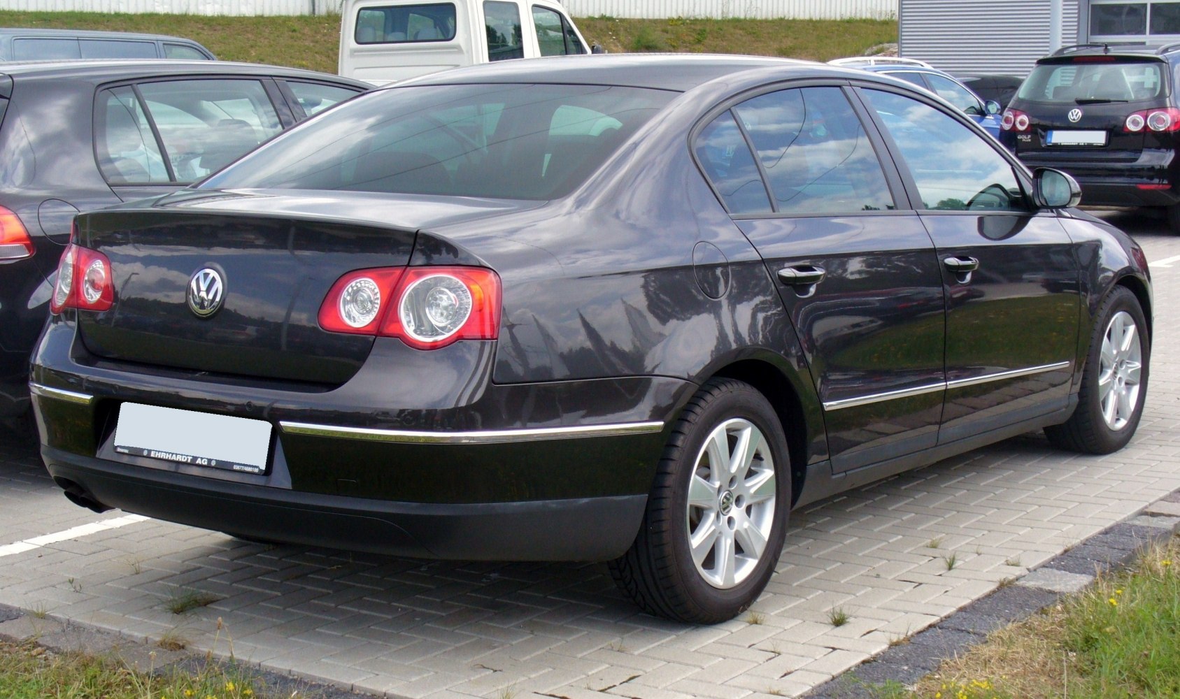 Rear-side view with distinct tail lights and alloy wheels