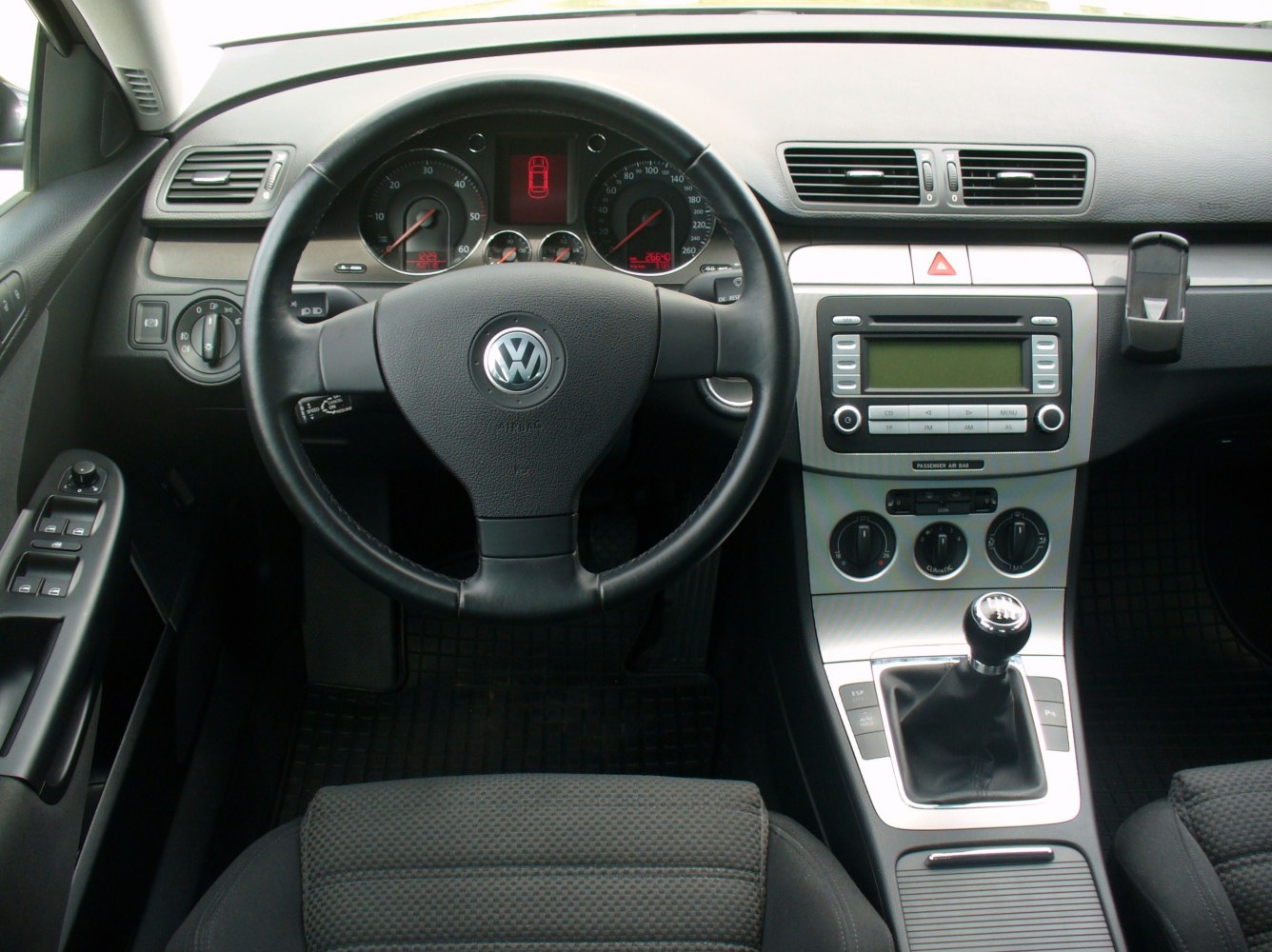 Interior dashboard with manual gear shift and multimedia system